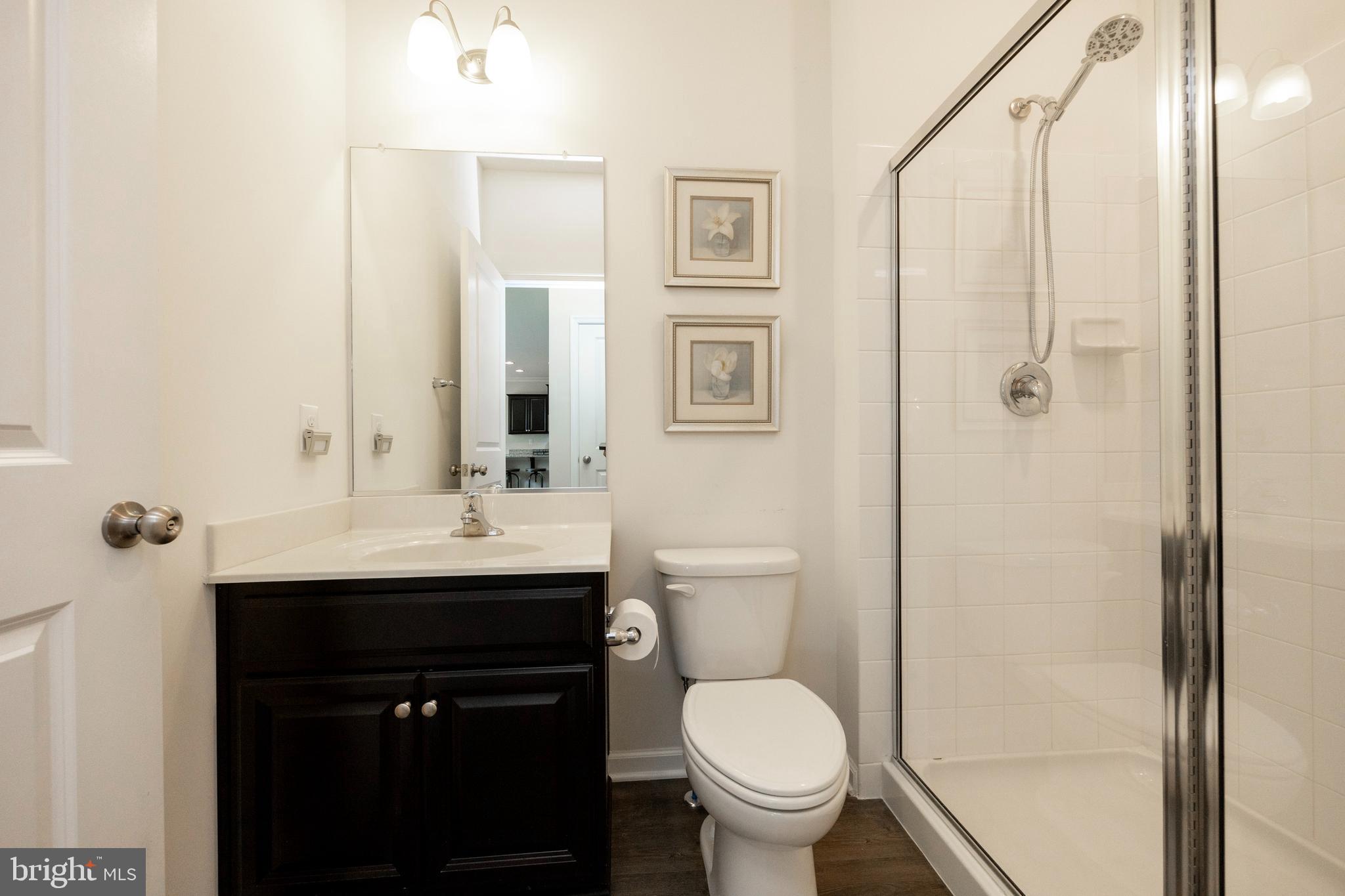 45 Nichols Mill Road Downingtown, PA 19335 - Photo 17 of 47 a bathroom with a sink toilet and shower