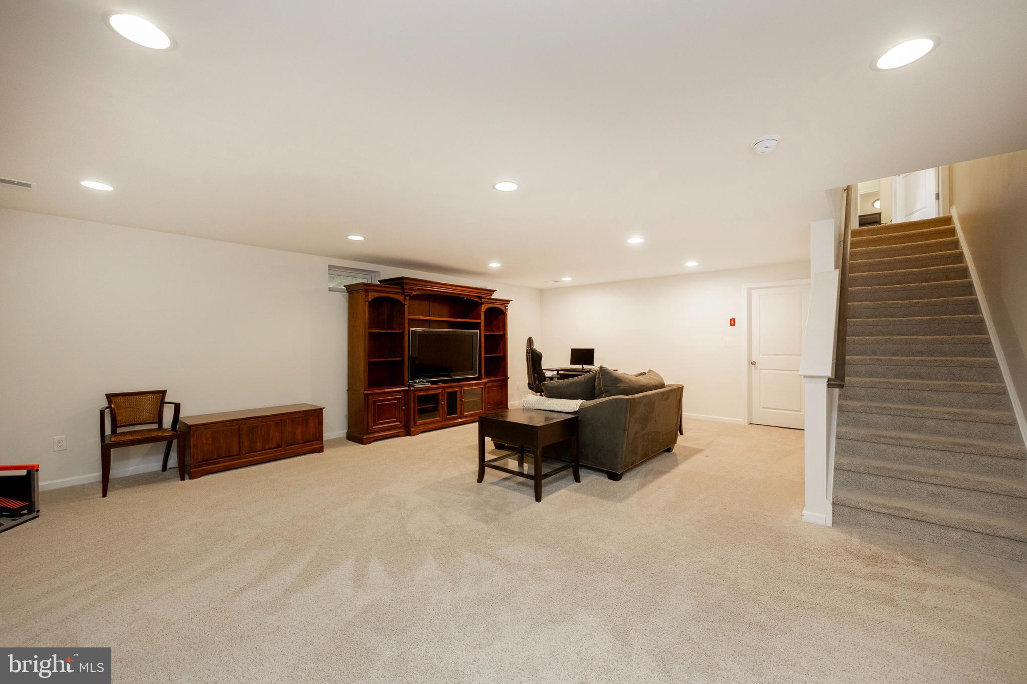 45 Nichols Mill Road Downingtown, PA 19335 - Photo 19 of 47 a living room with furniture and a flat screen tv