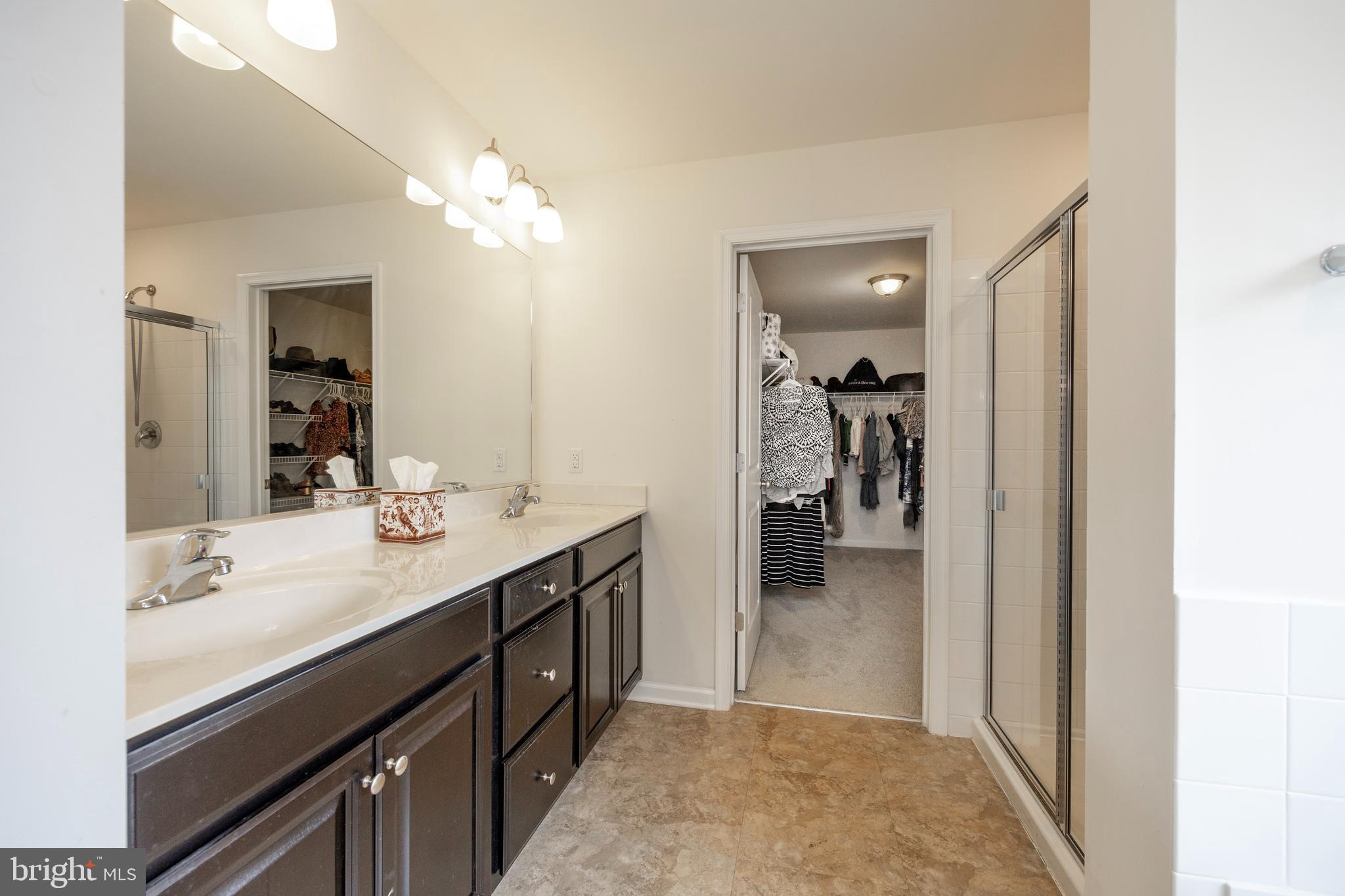 45 Nichols Mill Road Downingtown, PA 19335 - Photo 23 of 47 a en suite bathroom with a sink double vanity and a mirror