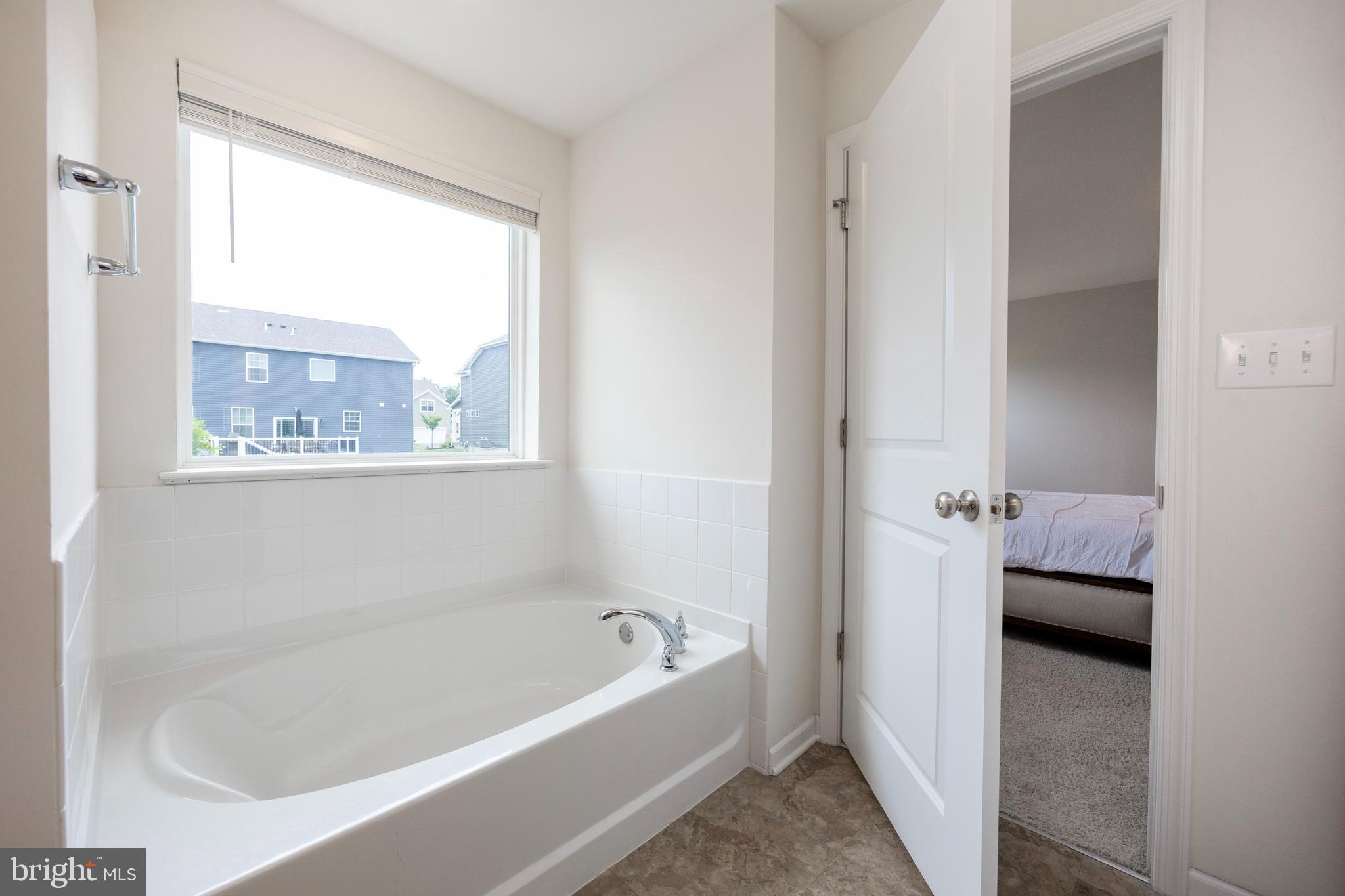 45 Nichols Mill Road Downingtown, PA 19335 - Photo 24 of 47 a bathroom with a tub and shower