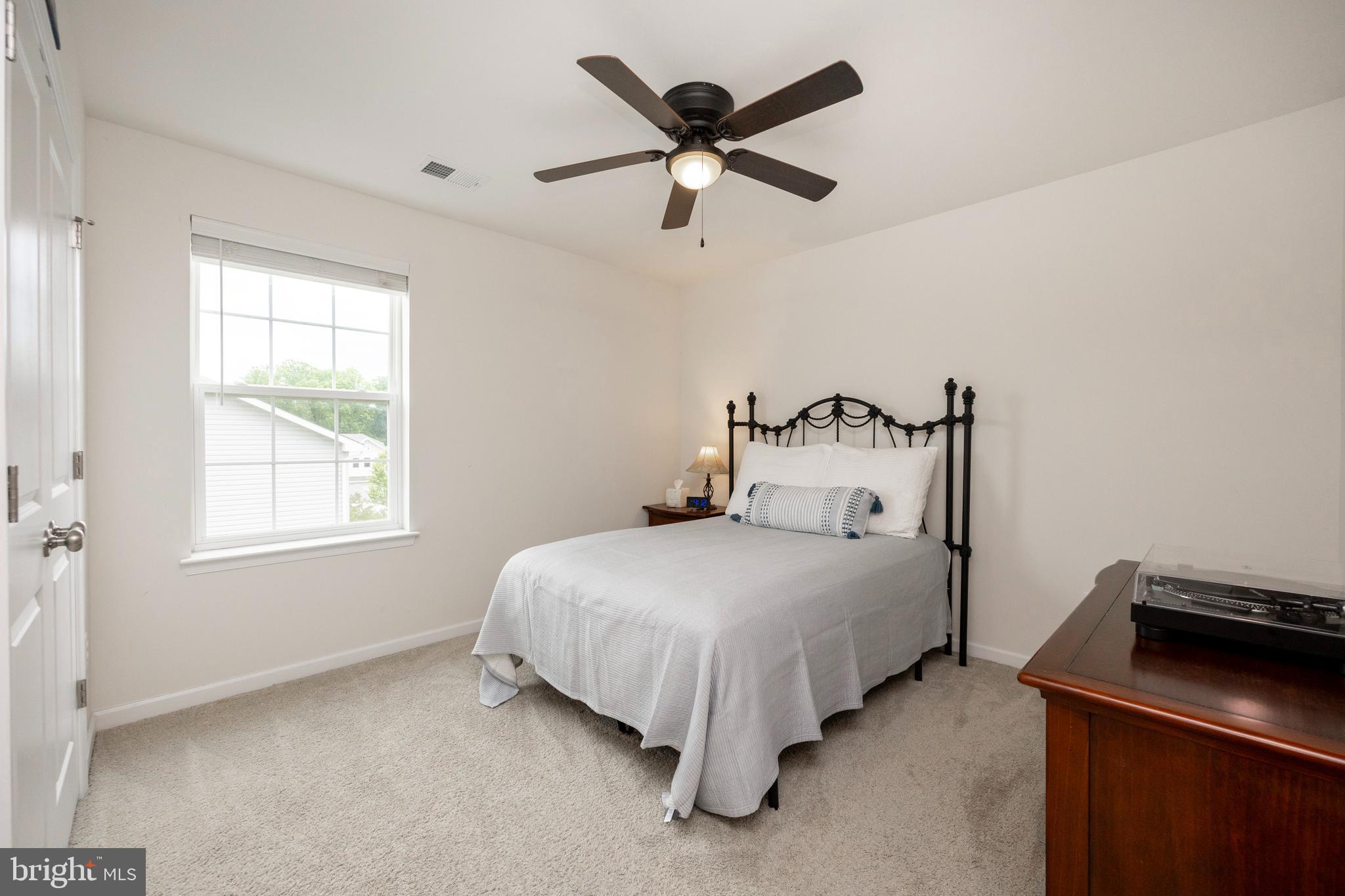 45 Nichols Mill Road Downingtown, PA 19335 - Photo 26 of 47 a bedroom with a bed and window