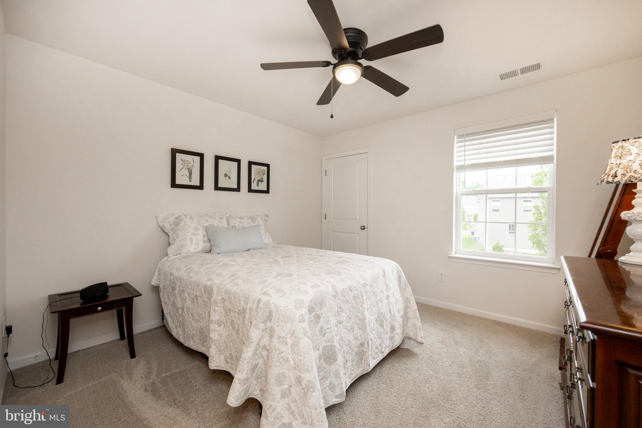 45 Nichols Mill Road Downingtown, PA 19335 - Photo 29 of 47 a bedroom with a bed and a window