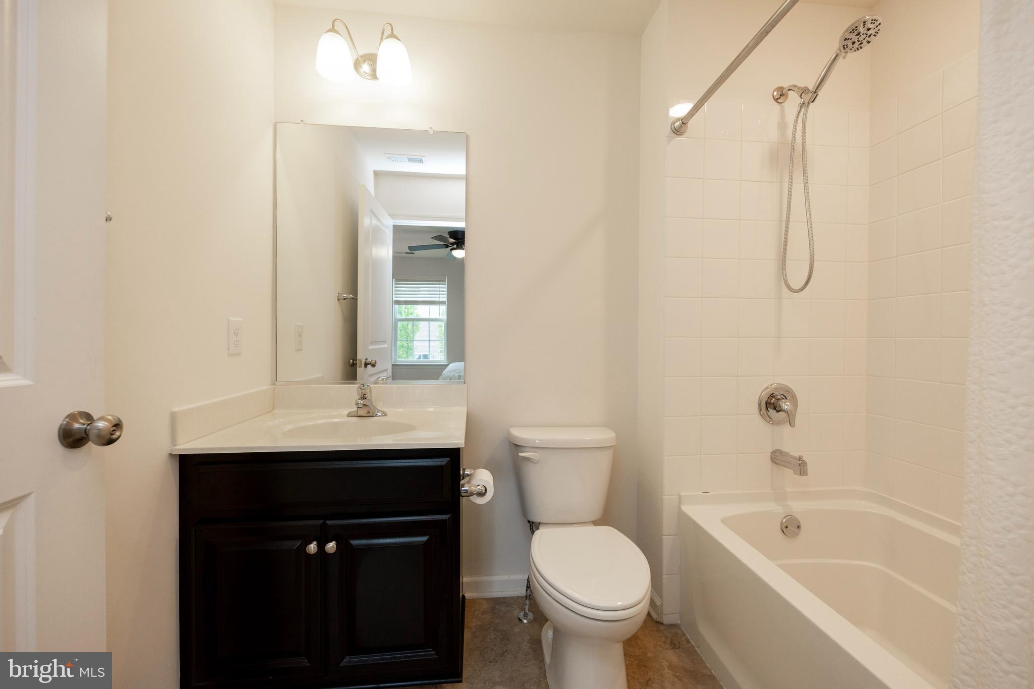 45 Nichols Mill Road Downingtown, PA 19335 - Photo 30 of 47 a bathroom with a sink a toilet and shower