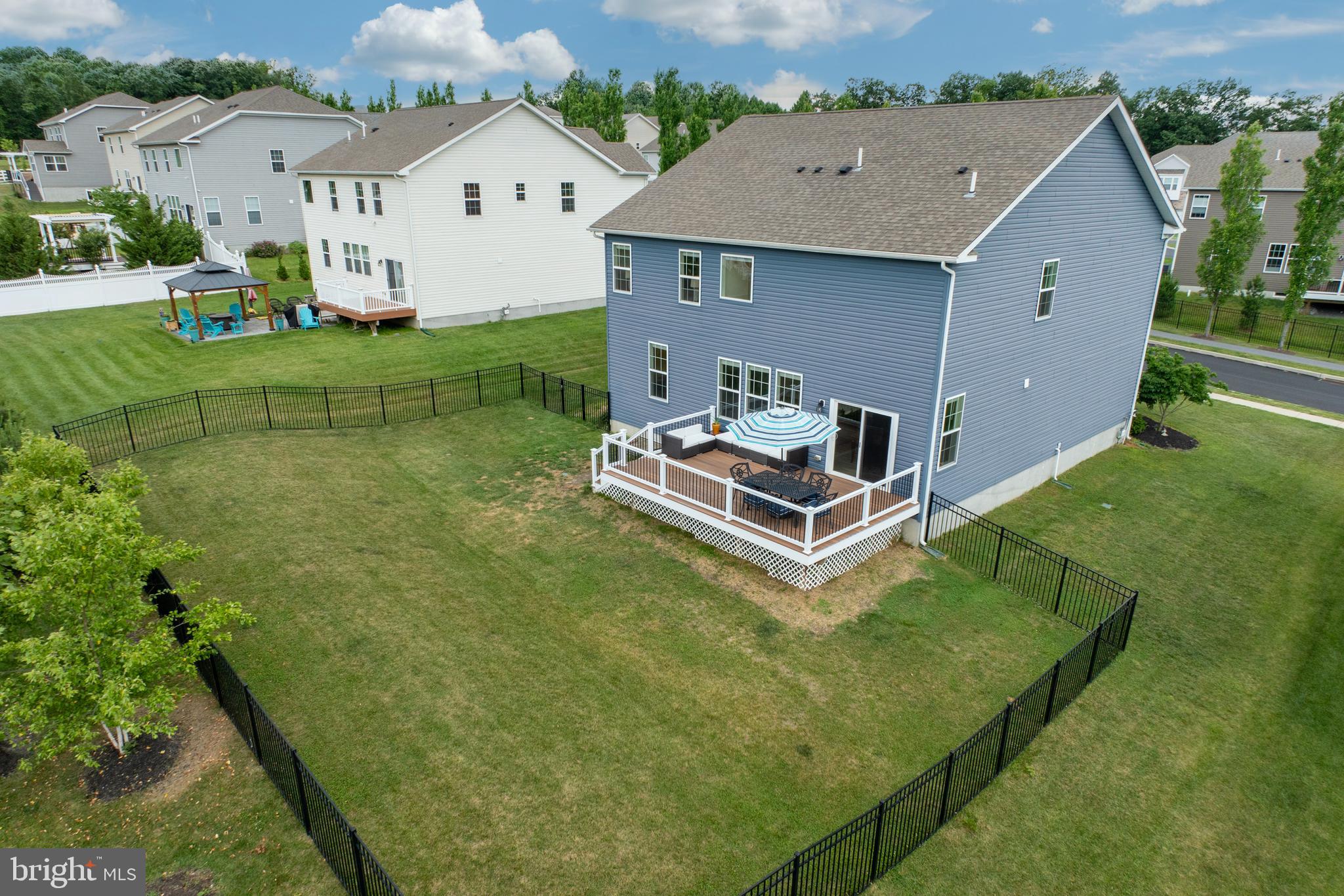 45 Nichols Mill Road Downingtown, PA 19335 - Photo 38 of 47 an aerial view of a house with swimming pool garden and mountain view