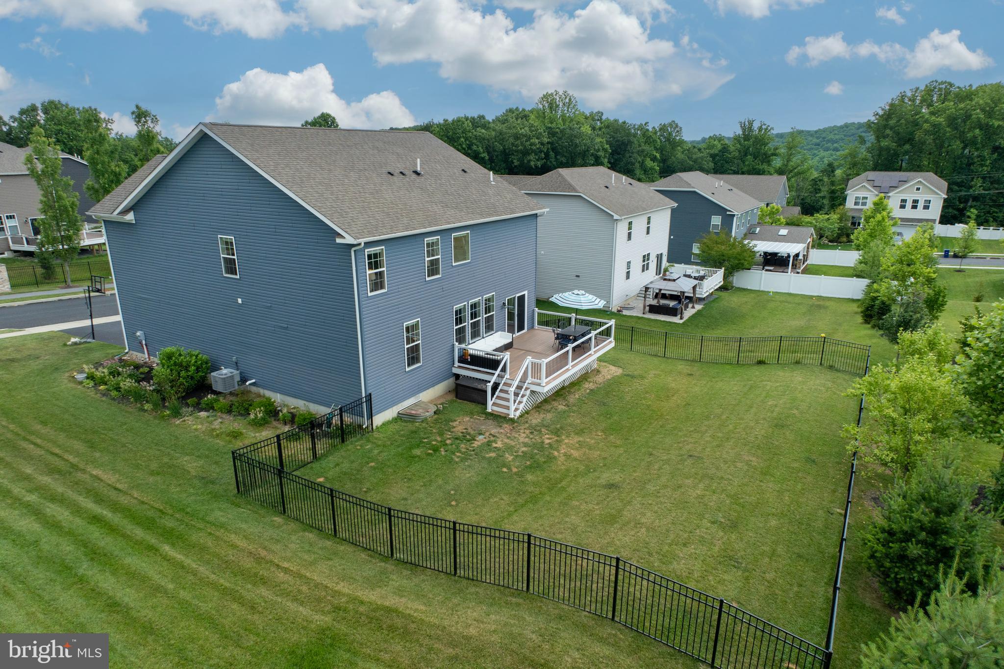 45 Nichols Mill Road Downingtown, PA 19335 - Photo 41 of 47 a aerial view of a house with table and chairs