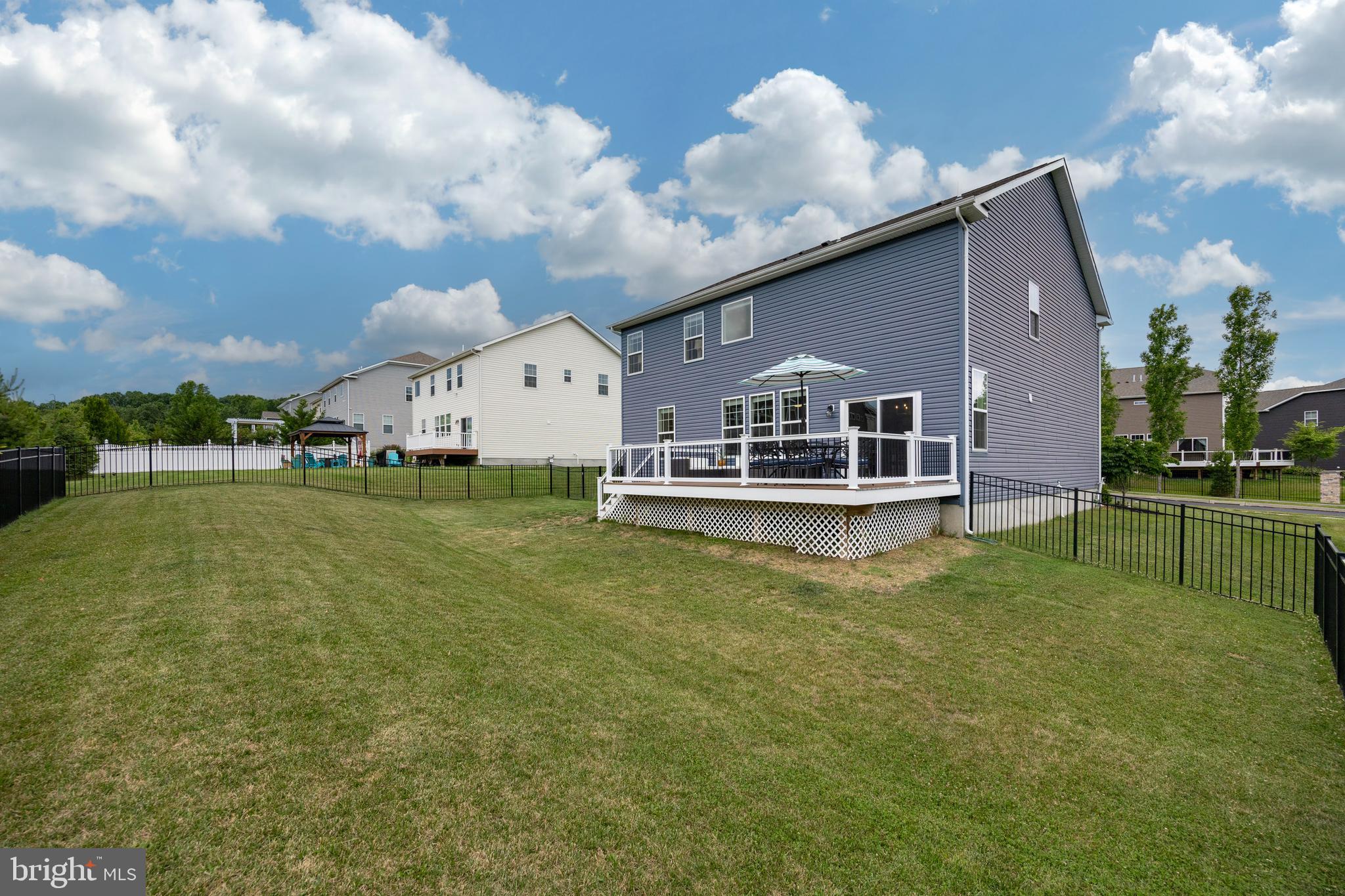 45 Nichols Mill Road Downingtown, PA 19335 - Photo 43 of 47 a view of a house with a big yard and large trees