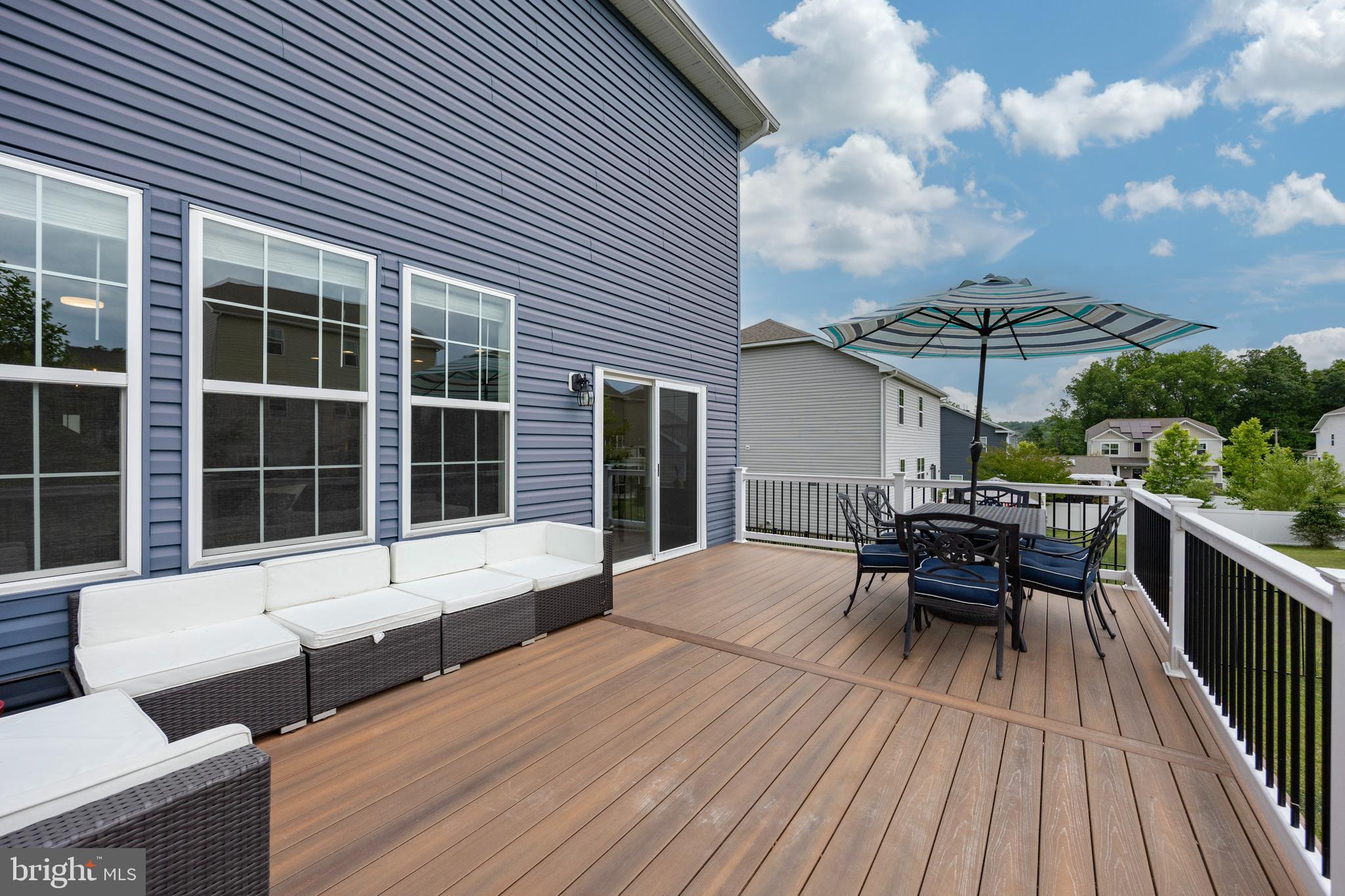 45 Nichols Mill Road Downingtown, PA 19335 - Photo 46 of 47 a roof deck with a table and chairs
