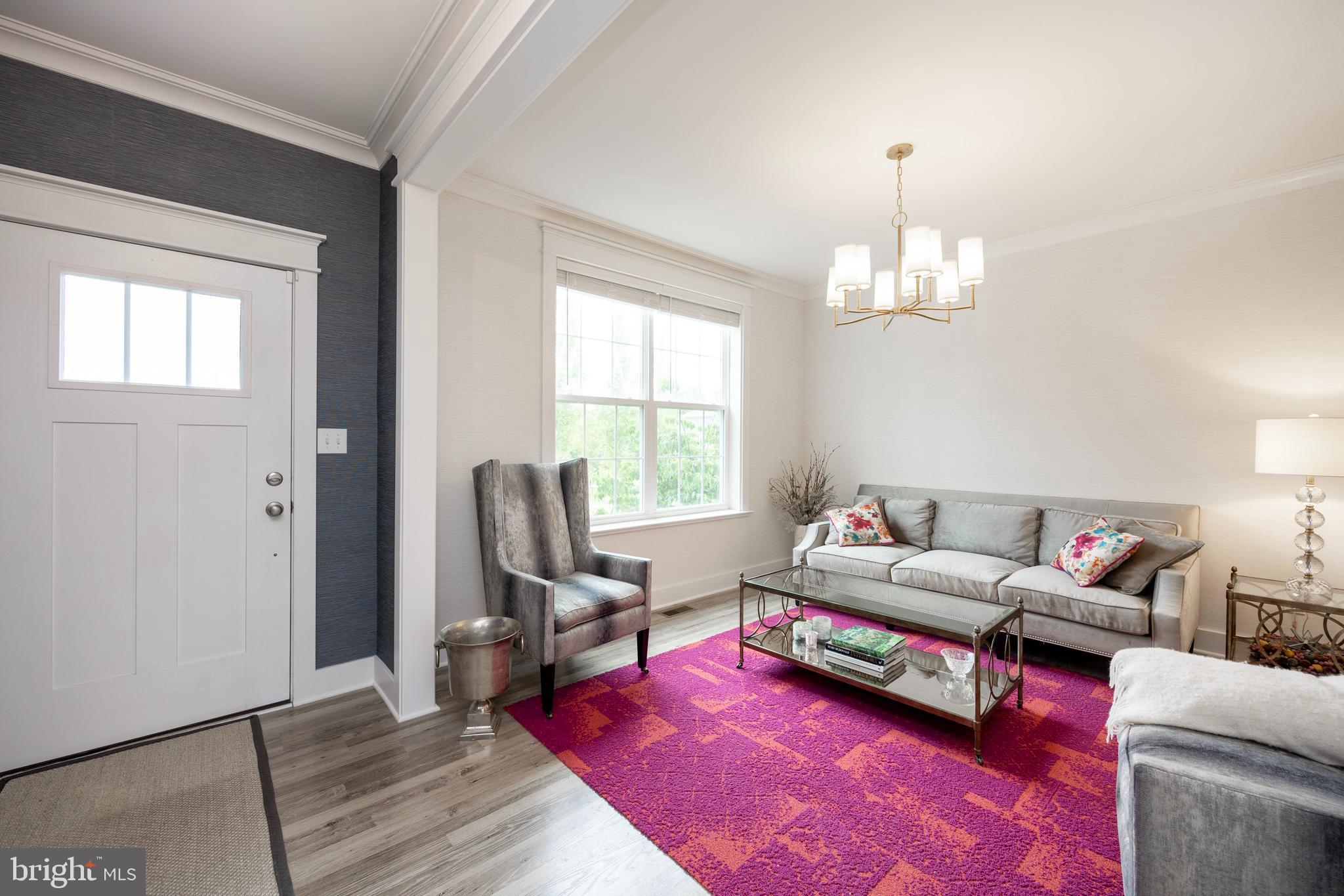 45 Nichols Mill Road Downingtown, PA 19335 - Photo 5 of 47 a living room with furniture and a wooden floor