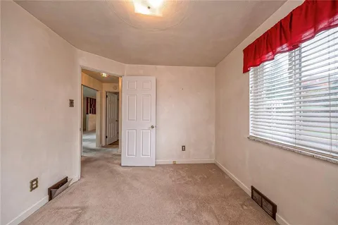 an empty room with a window