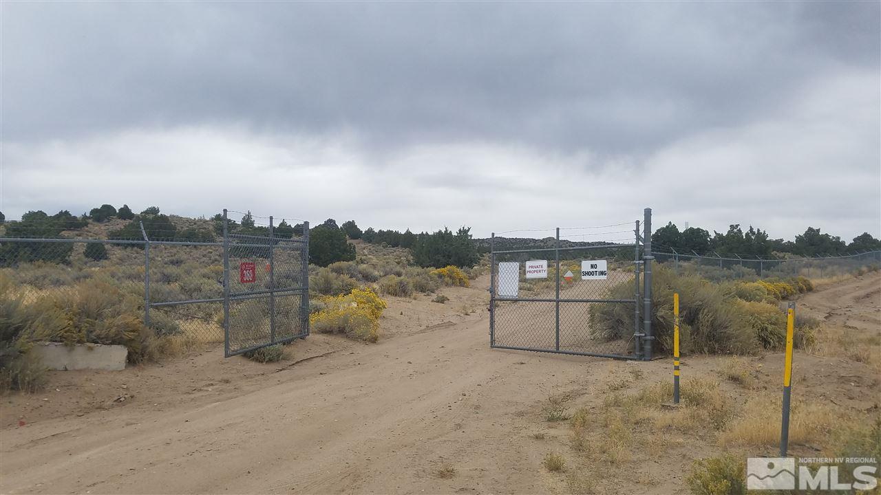 0 Lemmon Drive Reno, NV 89508 - Photo 3 of 15 a view of a dry yard with wooden fence