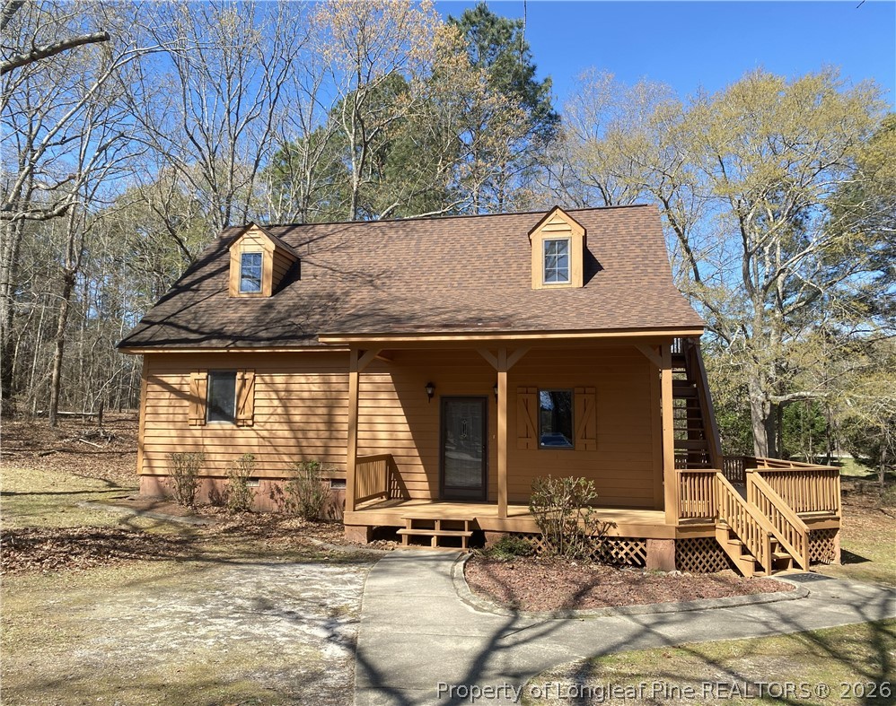 45 Lookout Point Sanford, NC 27332 - Photo 1 of 15 a view of a house with backyard