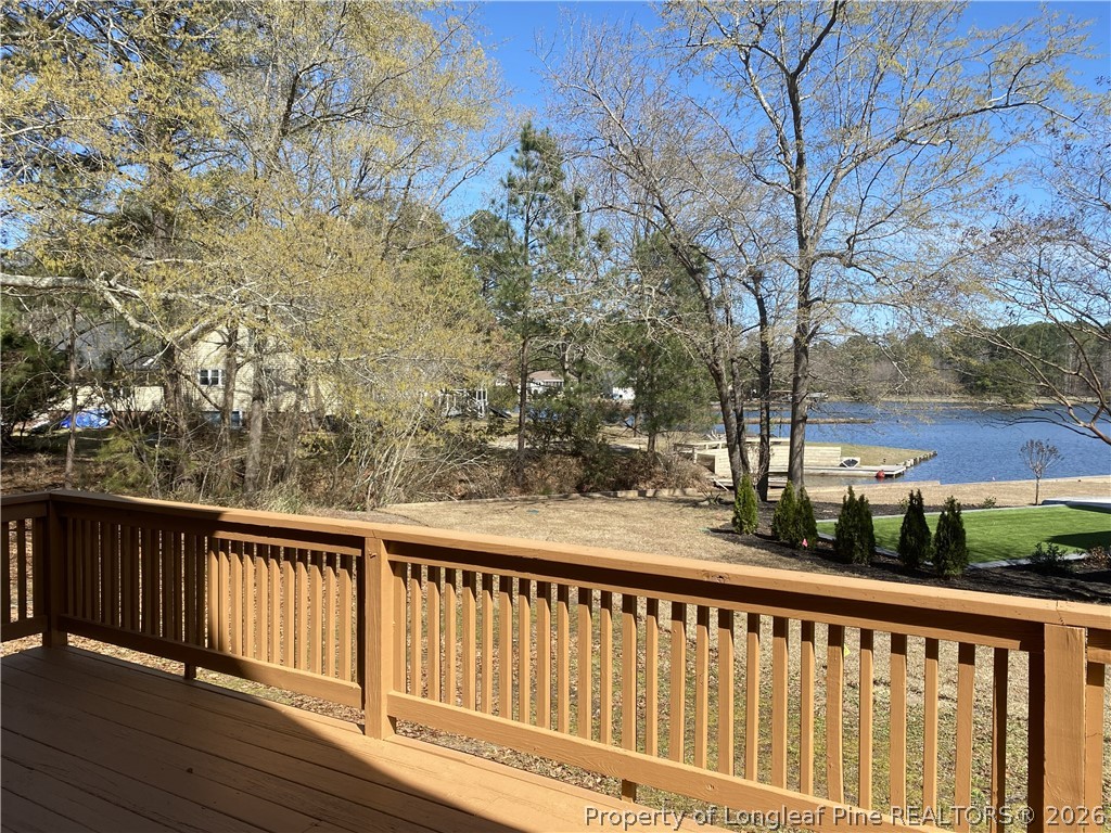 45 Lookout Point Sanford, NC 27332 - Photo 15 of 15 a balcony with wooden floor and fence