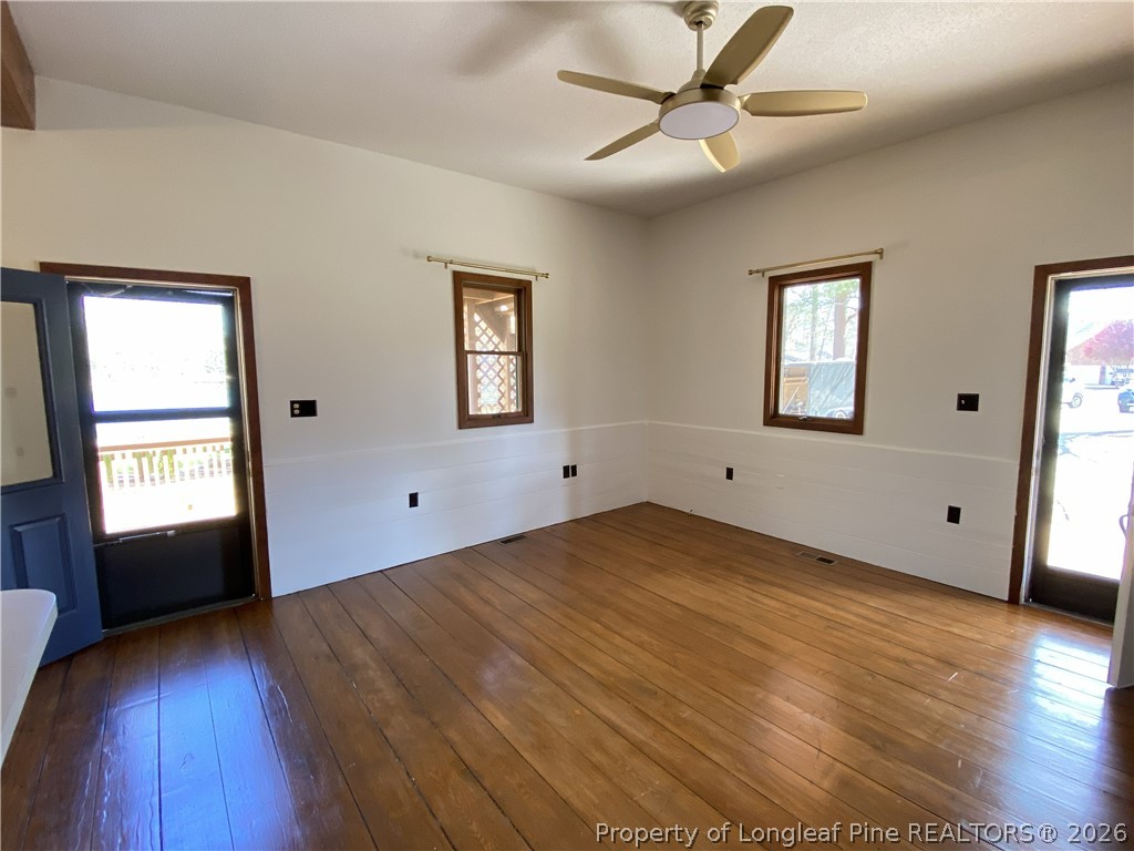 45 Lookout Point Sanford, NC 27332 - Photo 2 of 15 a view of an empty room with window and wooden floor