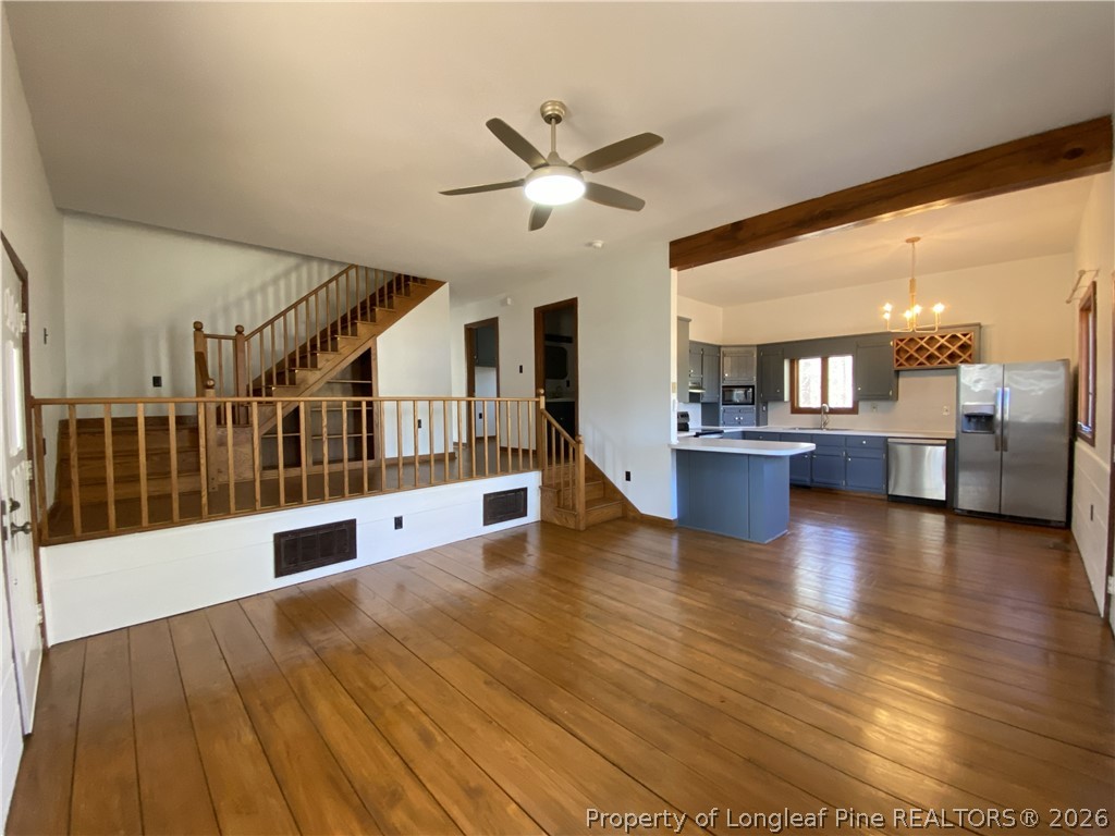 45 Lookout Point Sanford, NC 27332 - Photo 3 of 15 a view of a living room with kitchen view and a wooden floor