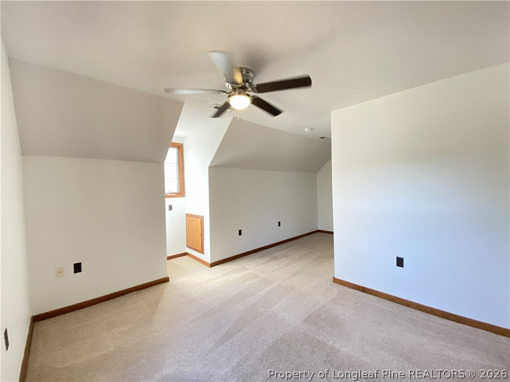 45 Lookout Point Sanford, NC 27332 - Photo 10 of 15 a view of a room with a ceiling fan and a fan