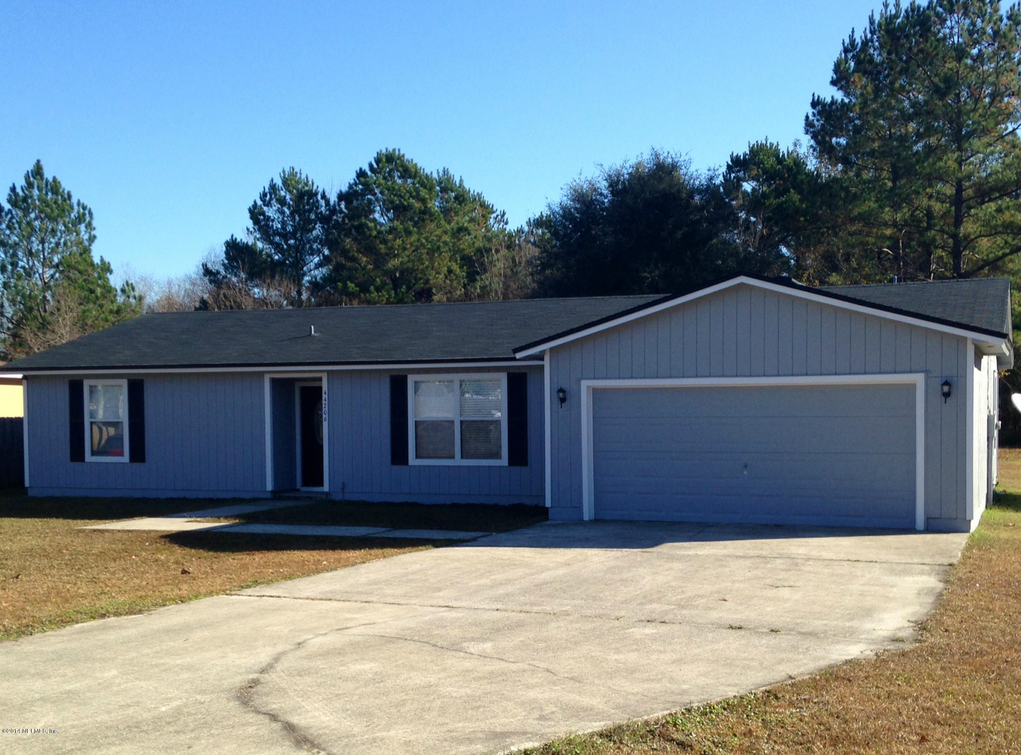 44206 Quail Rdg Drive Callahan, FL 32011 - Photo 15 of 17 a house with a outdoor space