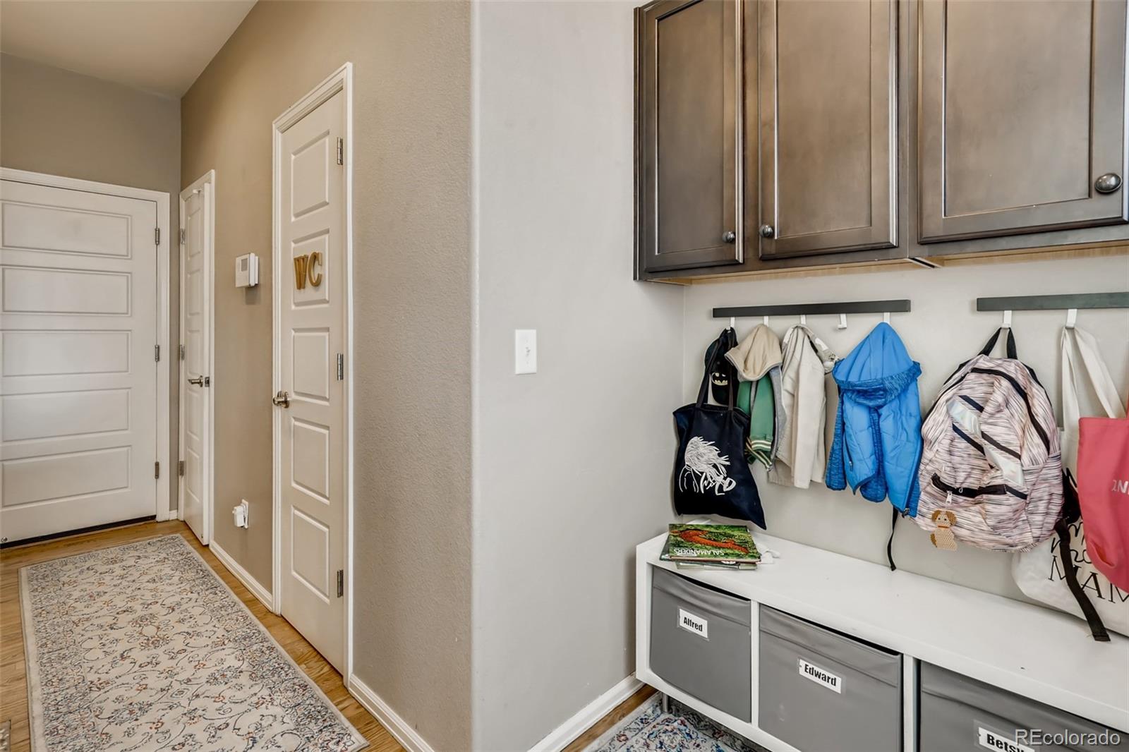 8537 Raspberry Drive Frederick, CO 80504 - Photo 26 of 31 a room with storage and utility