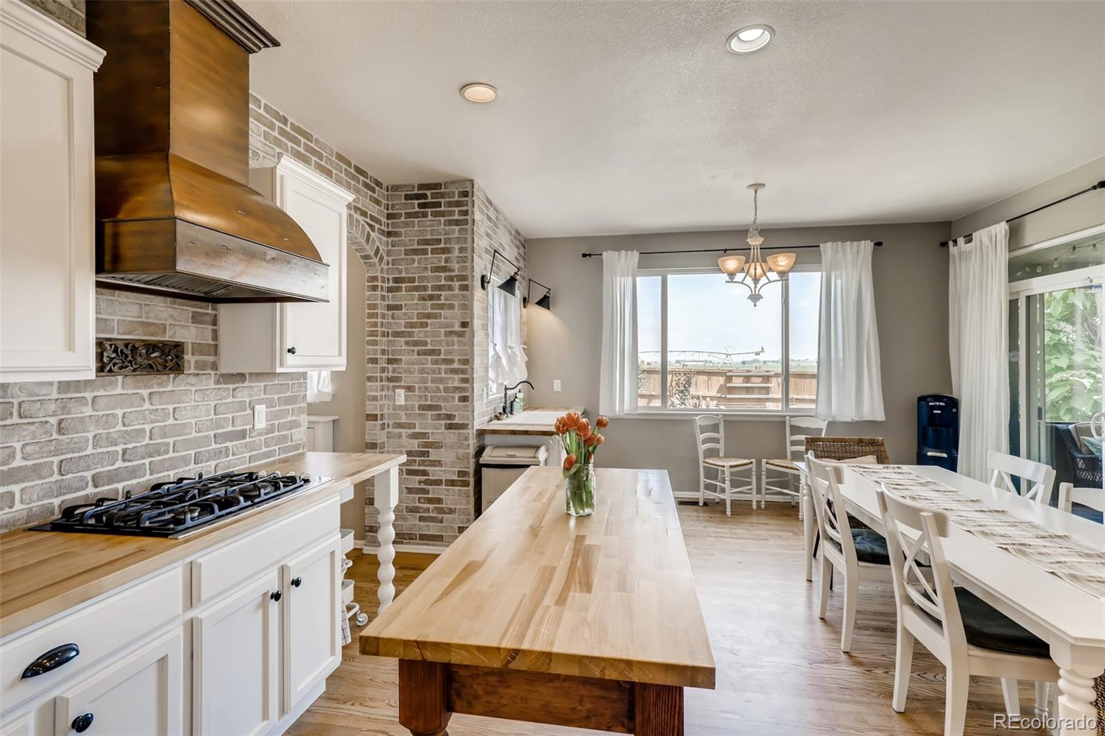 8537 Raspberry Drive Frederick, CO 80504 - Photo 6 of 31 a kitchen with lots of counter top space