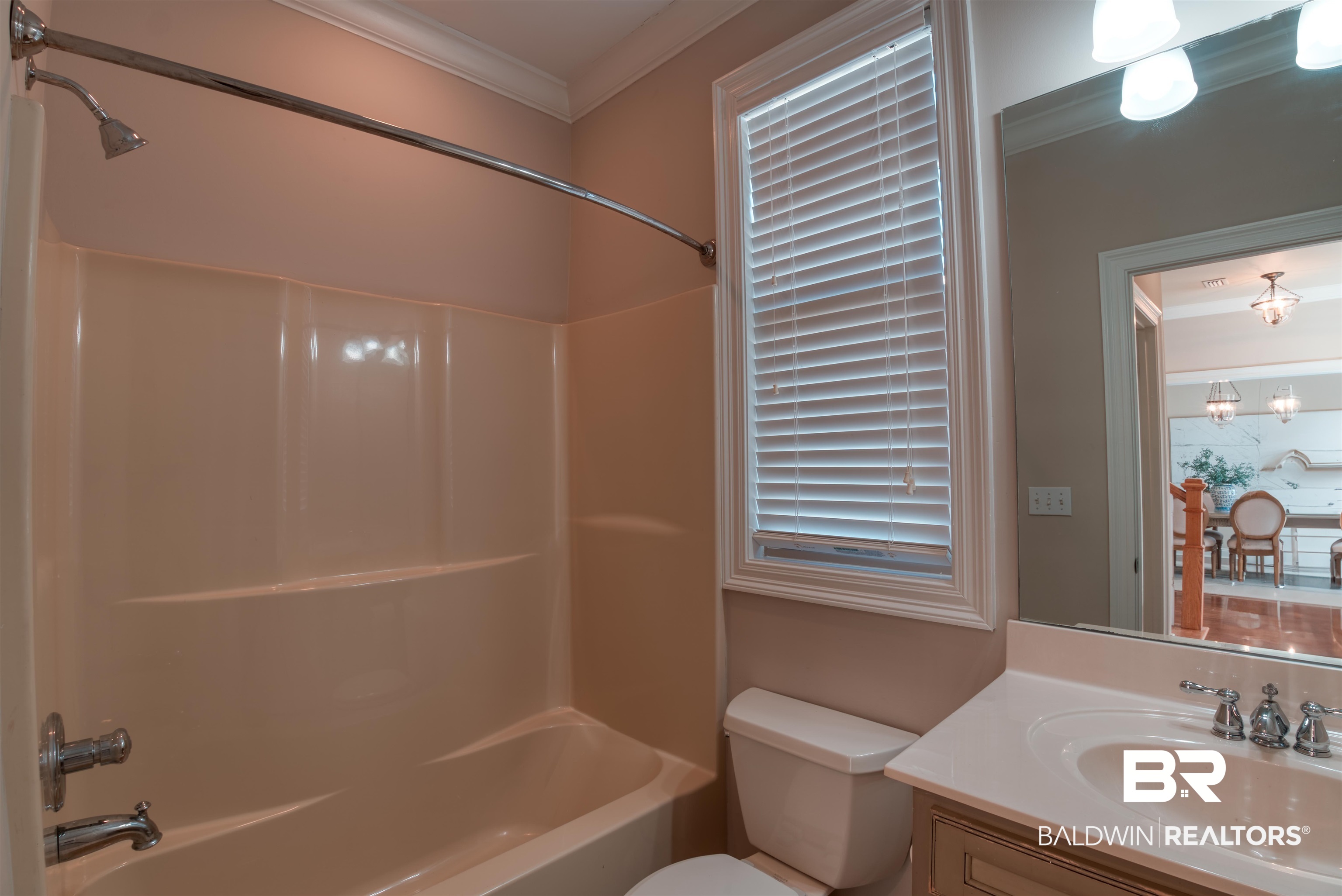 24561 Austin Road Daphne, AL 36526 - Photo 29 of 57 Full bathroom featuring vanity, shower / tub combination, toilet, ornamental molding, and a notable chandelier