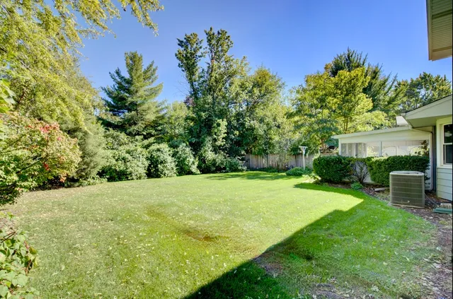 a view of a backyard with a garden