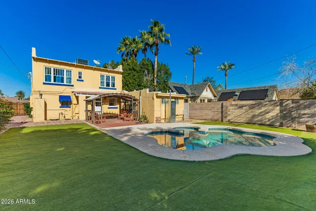 a view of a house with a swimming pool