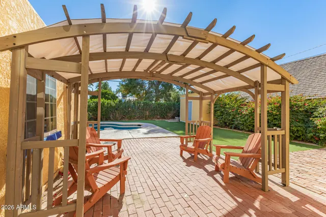 a view of yard with patio