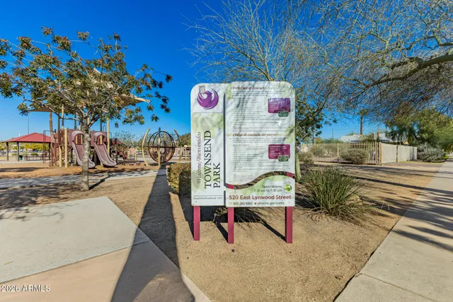 a view of the house with a yard