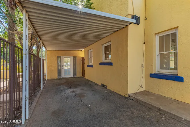 a view of empty room with windows