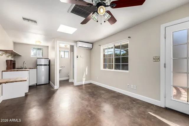 a view of an empty room and window