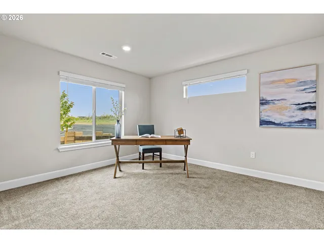 a view of a livingroom with furniture