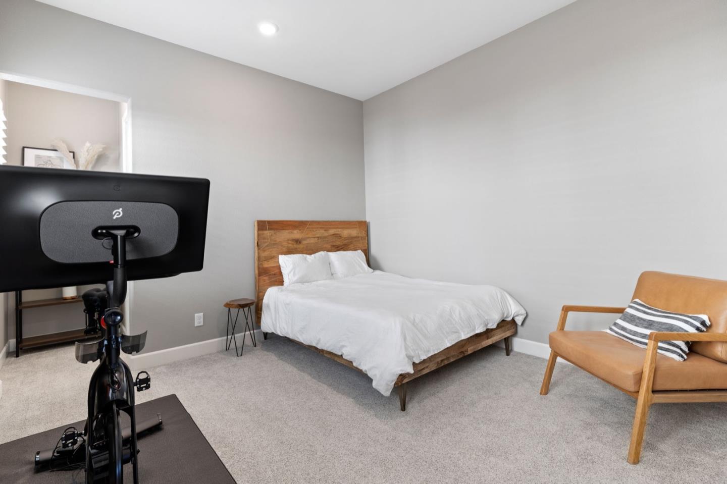 39941 Seal Drive Newark, CA 94560 - Photo 12 of 28 a bedroom with a bed and a chair