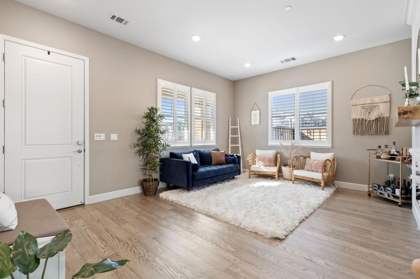 39941 Seal Drive Newark, CA 94560 - Photo 4 of 28 a living room with furniture and wooden floor