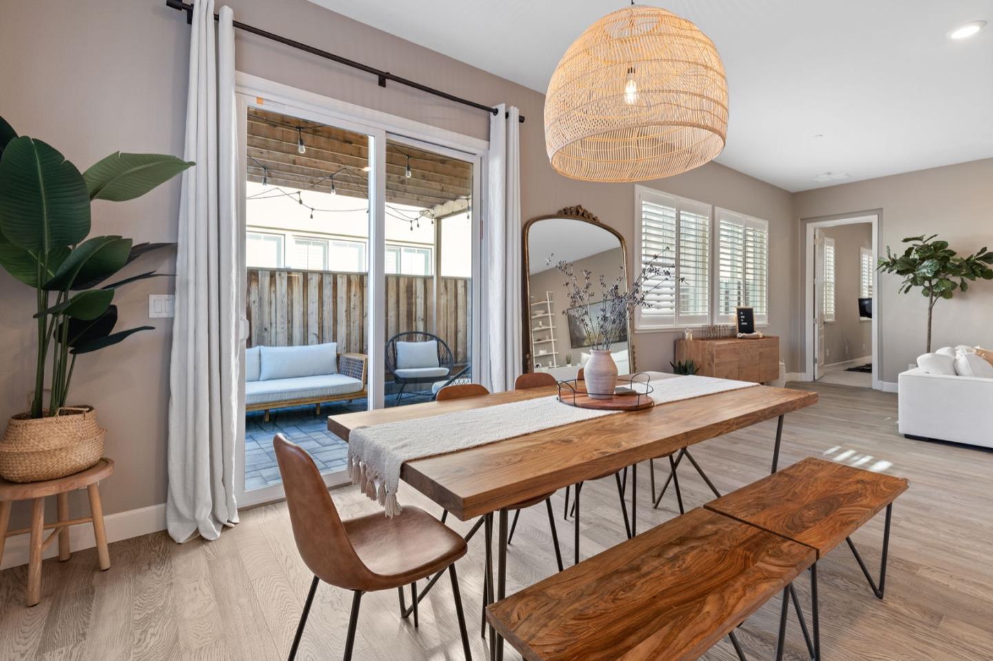 39941 Seal Drive Newark, CA 94560 - Photo 8 of 28 a view of a dining room with furniture window and wooden floor