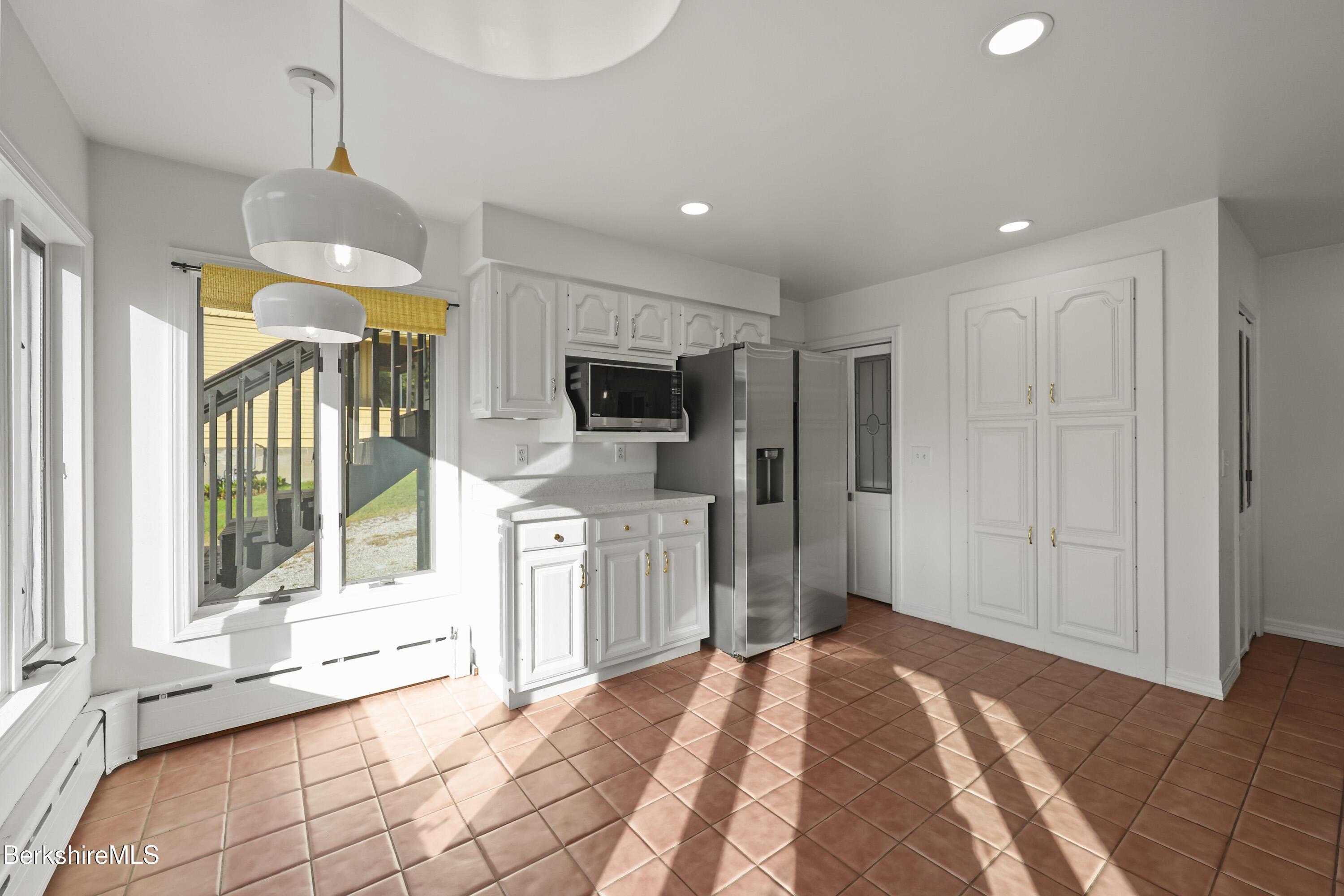 22 Maple Street Adams, MA 01220 - Photo 24 of 65 a bedroom with a bed closet and flat tv screen