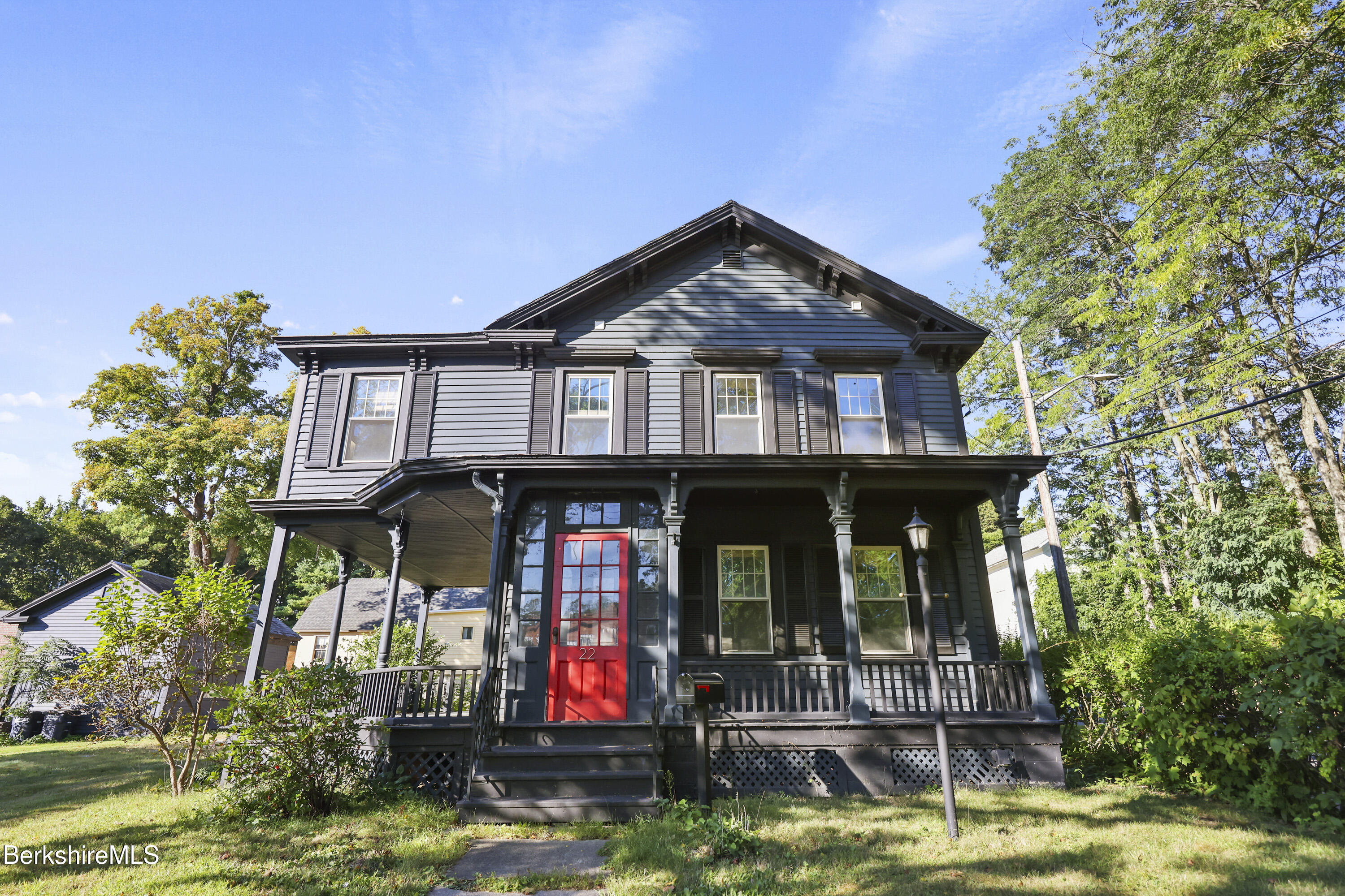22 Maple Street Adams, MA 01220 - Photo 3 of 65 a front view of a house with garden