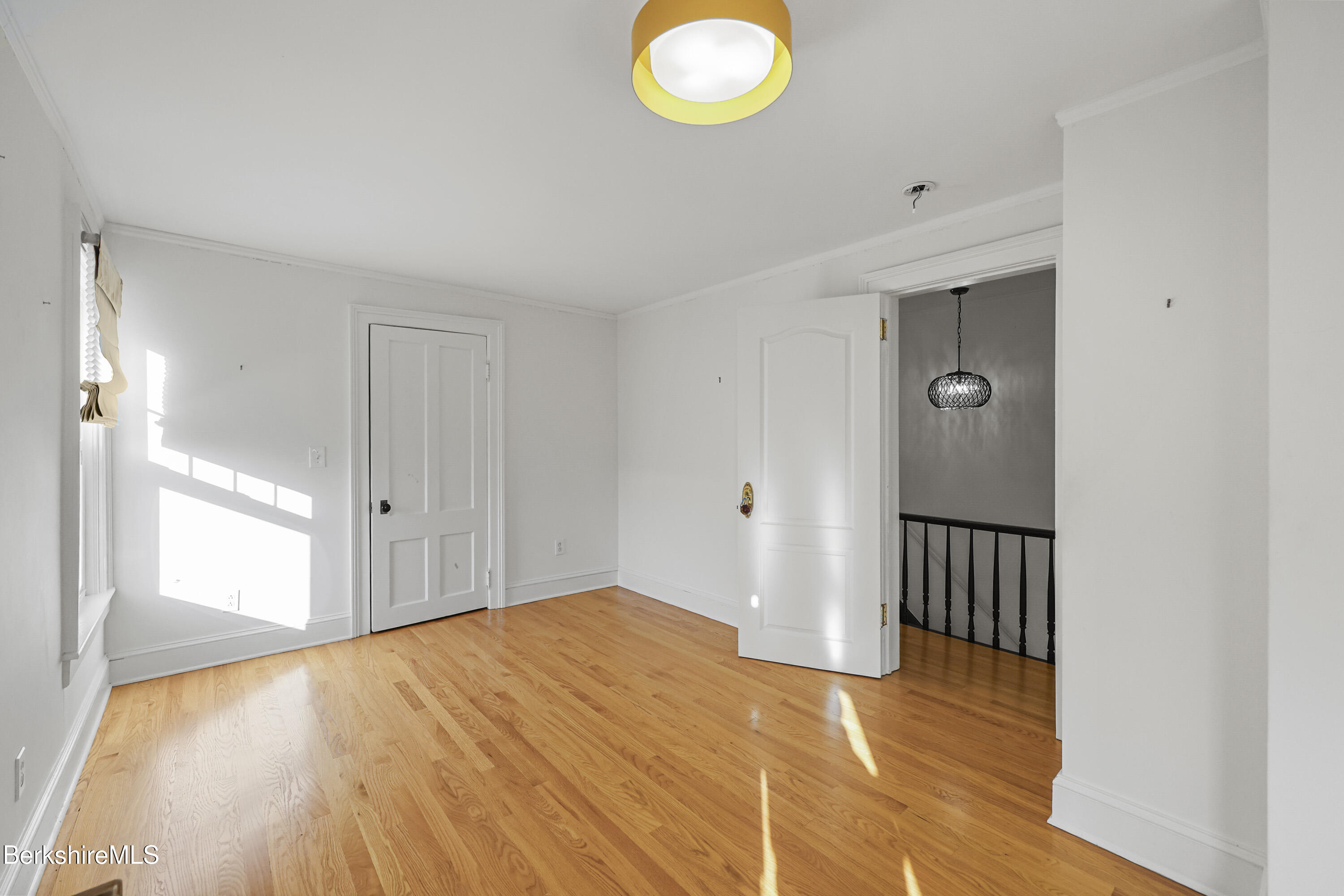 22 Maple Street Adams, MA 01220 - Photo 34 of 65 a view of a room with wooden floor and window