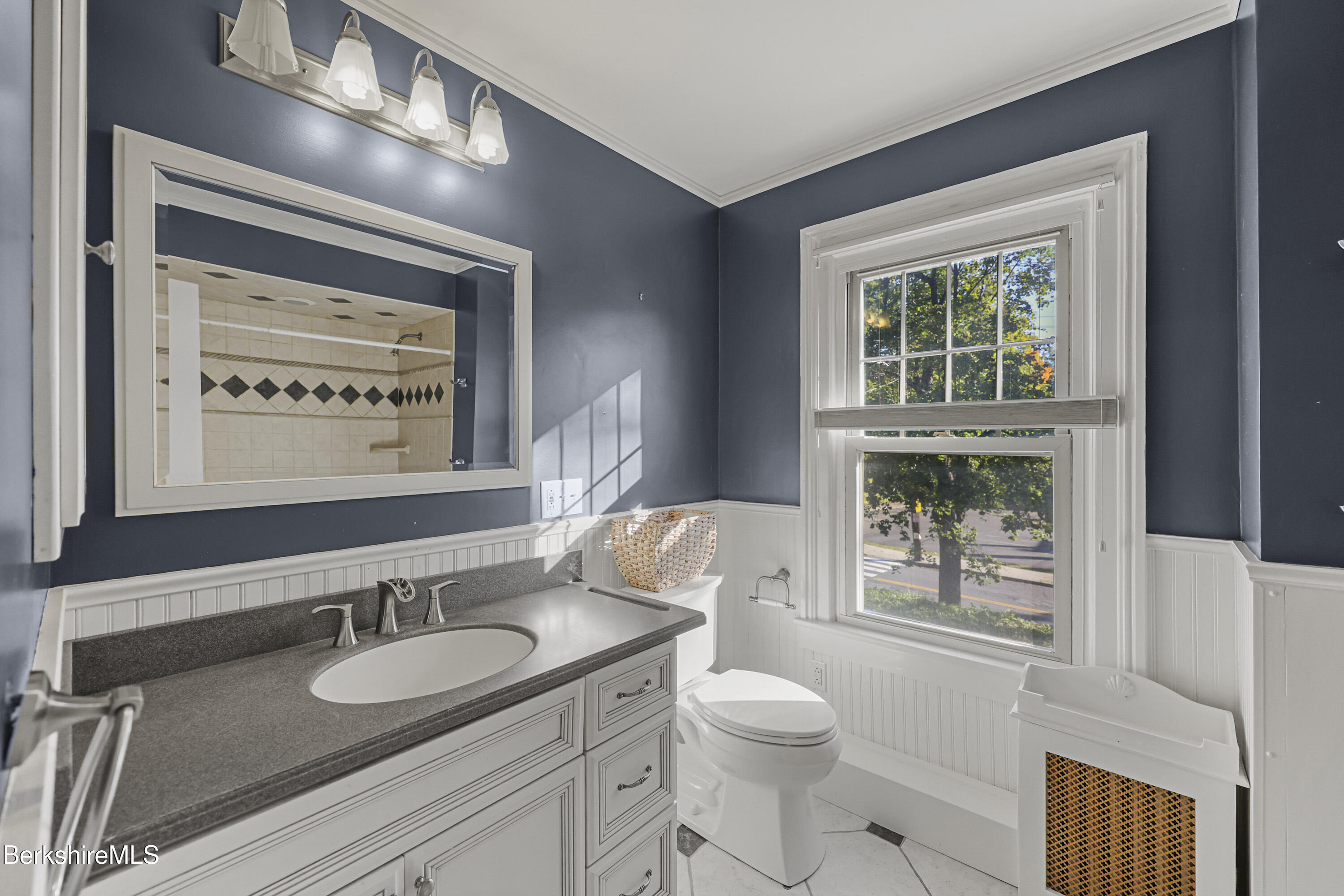 22 Maple Street Adams, MA 01220 - Photo 37 of 65 a bathroom with a toilet a sink and a large mirror