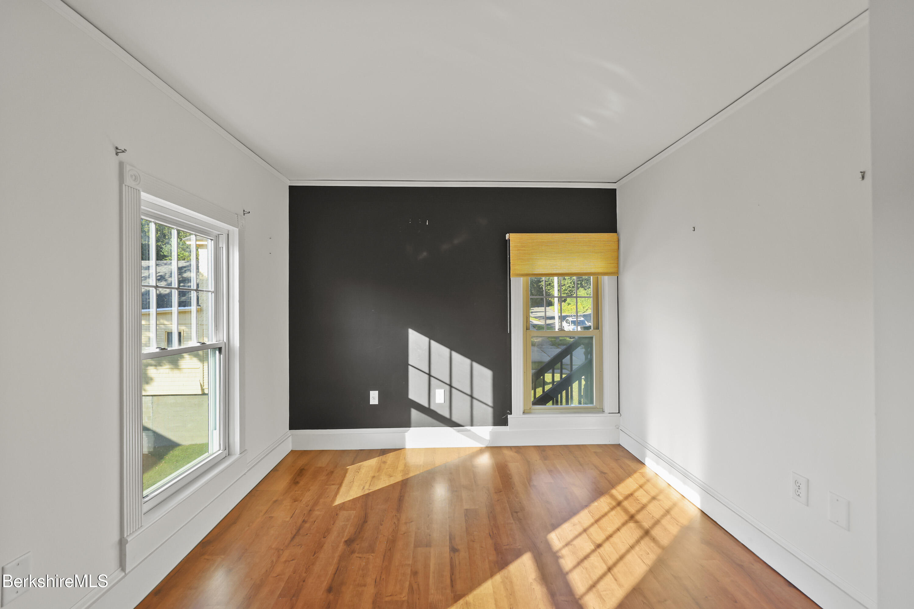 22 Maple Street Adams, MA 01220 - Photo 46 of 65 wooden floor in an empty room with a window