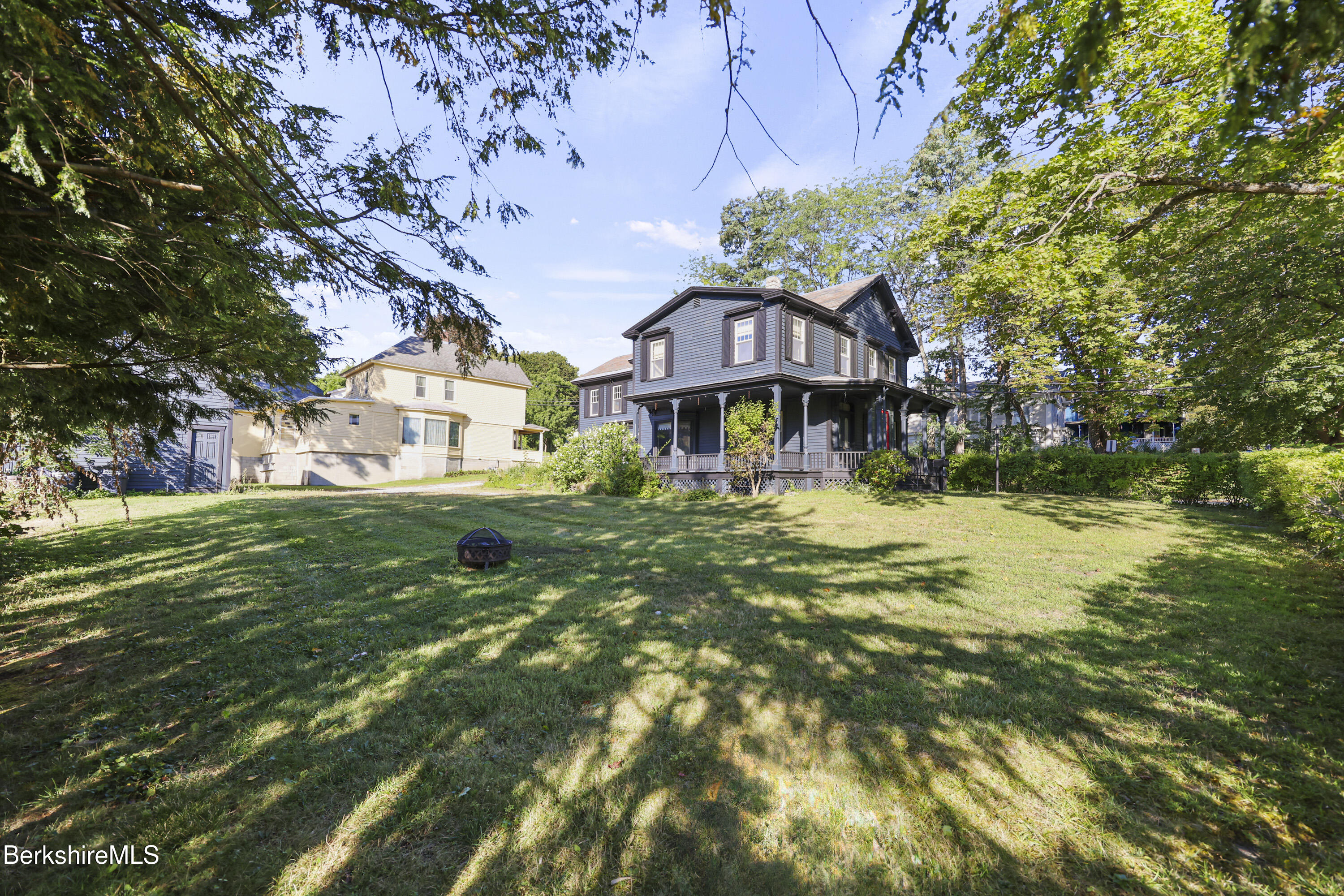 22 Maple Street Adams, MA 01220 - Photo 63 of 65 a front view of a house with a yard