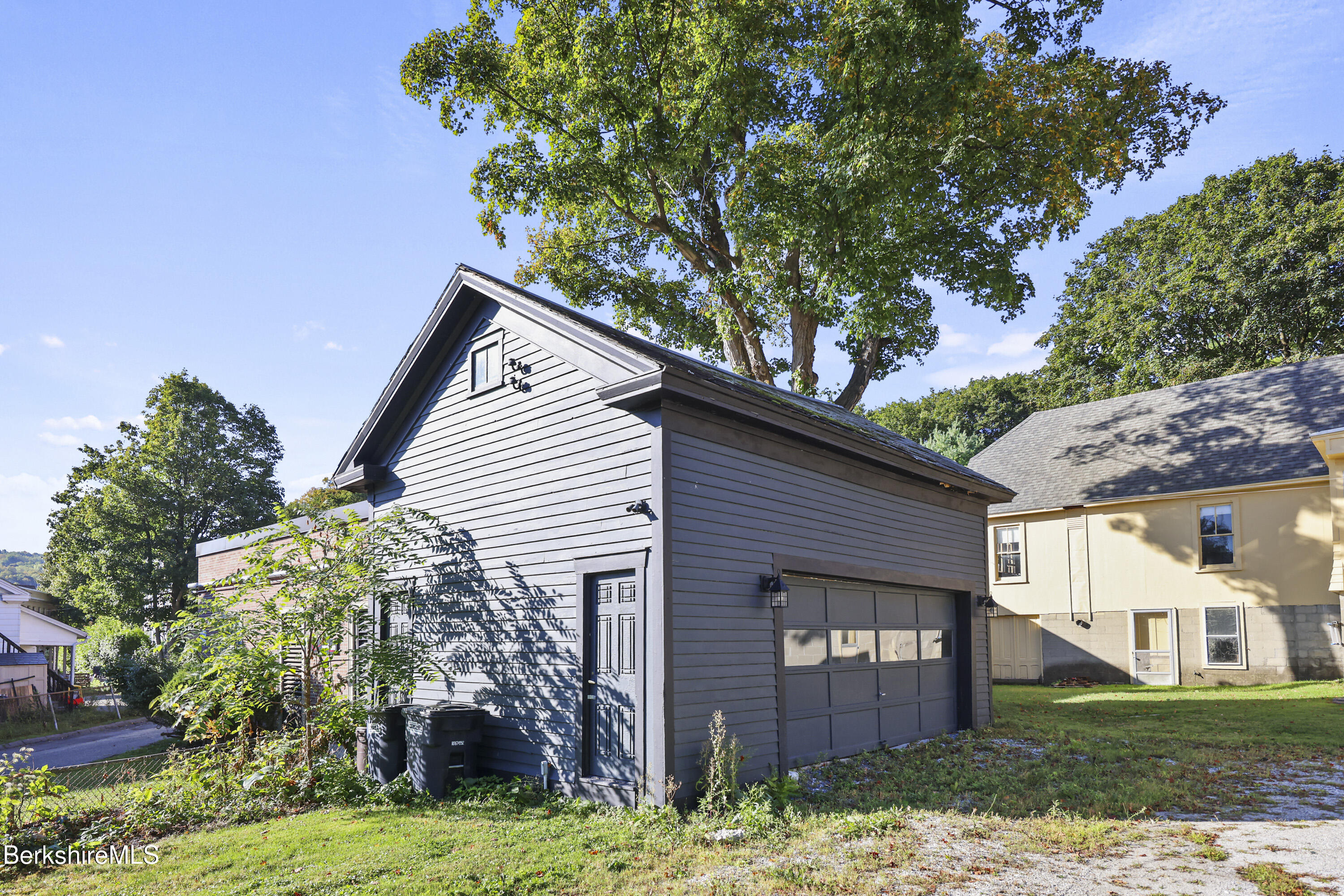 22 Maple Street Adams, MA 01220 - Photo 65 of 65 a front view of a house with a garden
