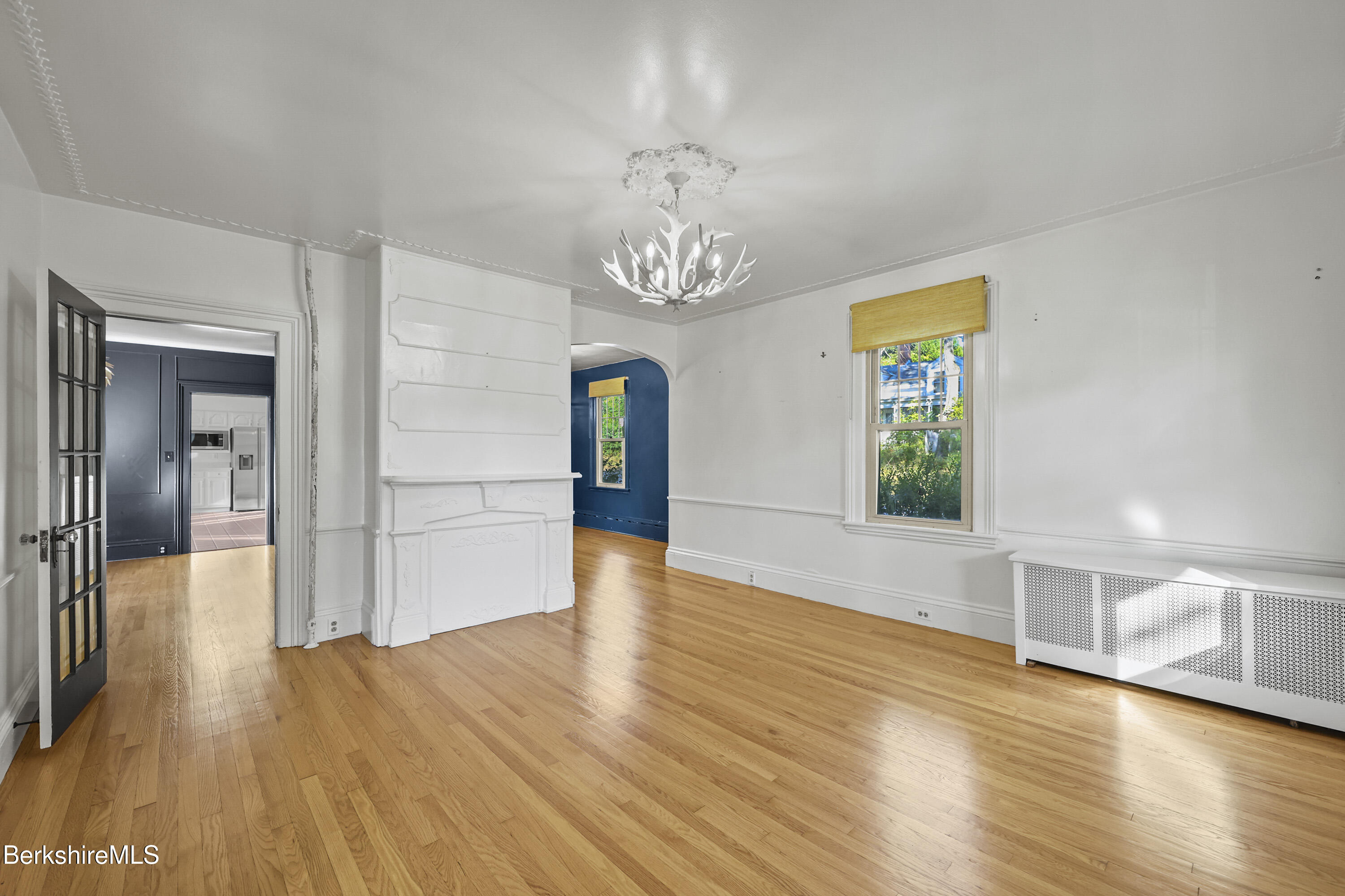 22 Maple Street Adams, MA 01220 - Photo 7 of 65 a view of a room with wooden floor staircase and a living room