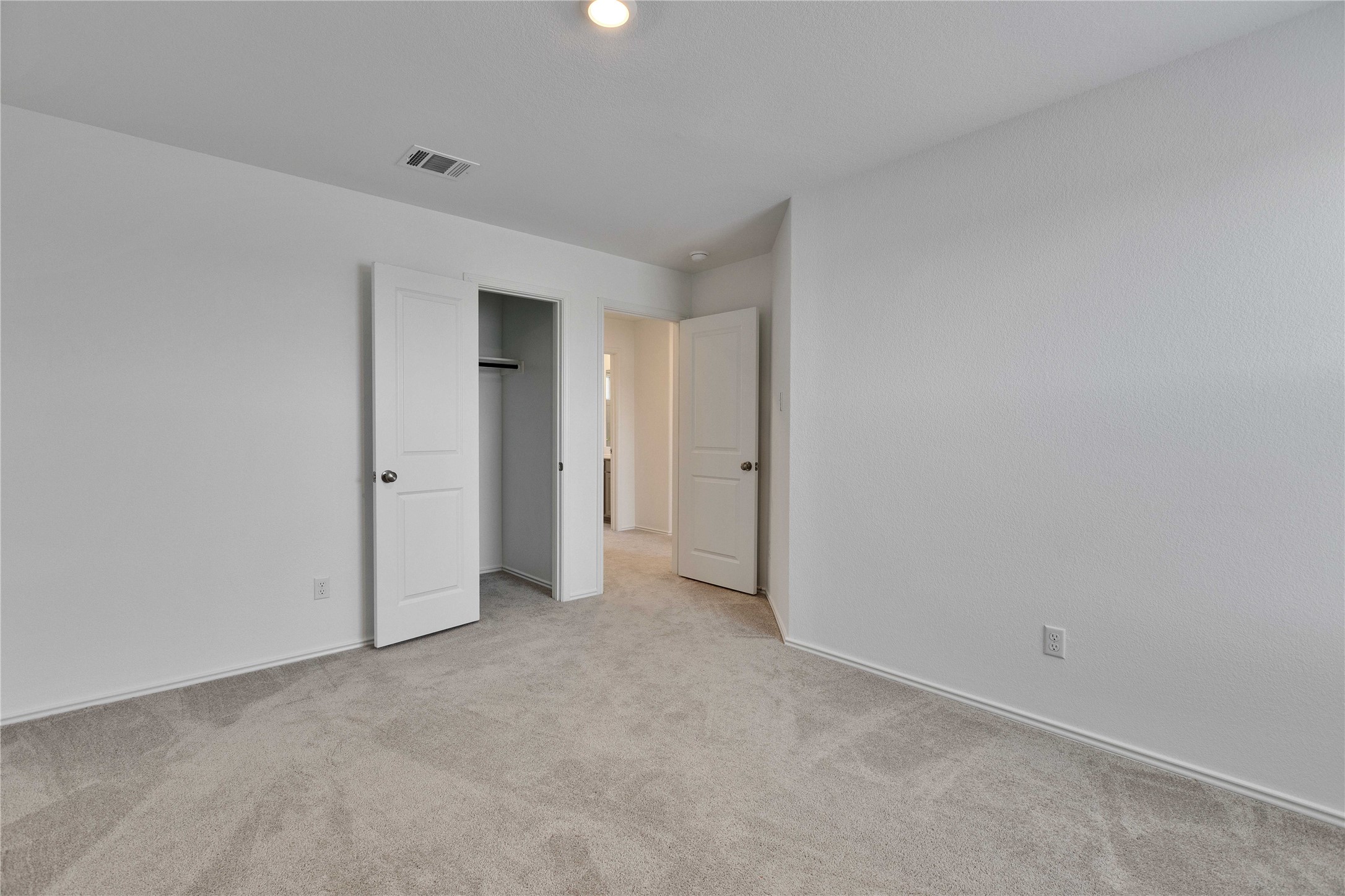 206 Canley Loop Hutto, TX 78634 - Photo 18 of 31 a view of an empty room and closet area