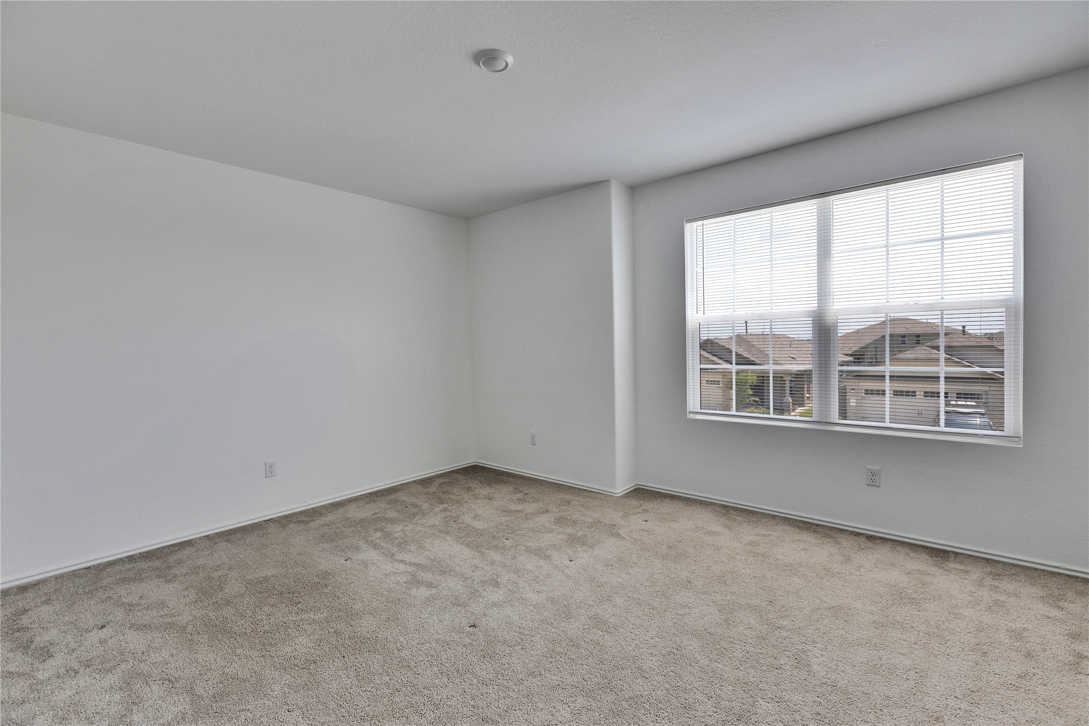 206 Canley Loop Hutto, TX 78634 - Photo 26 of 31 an empty room with a window