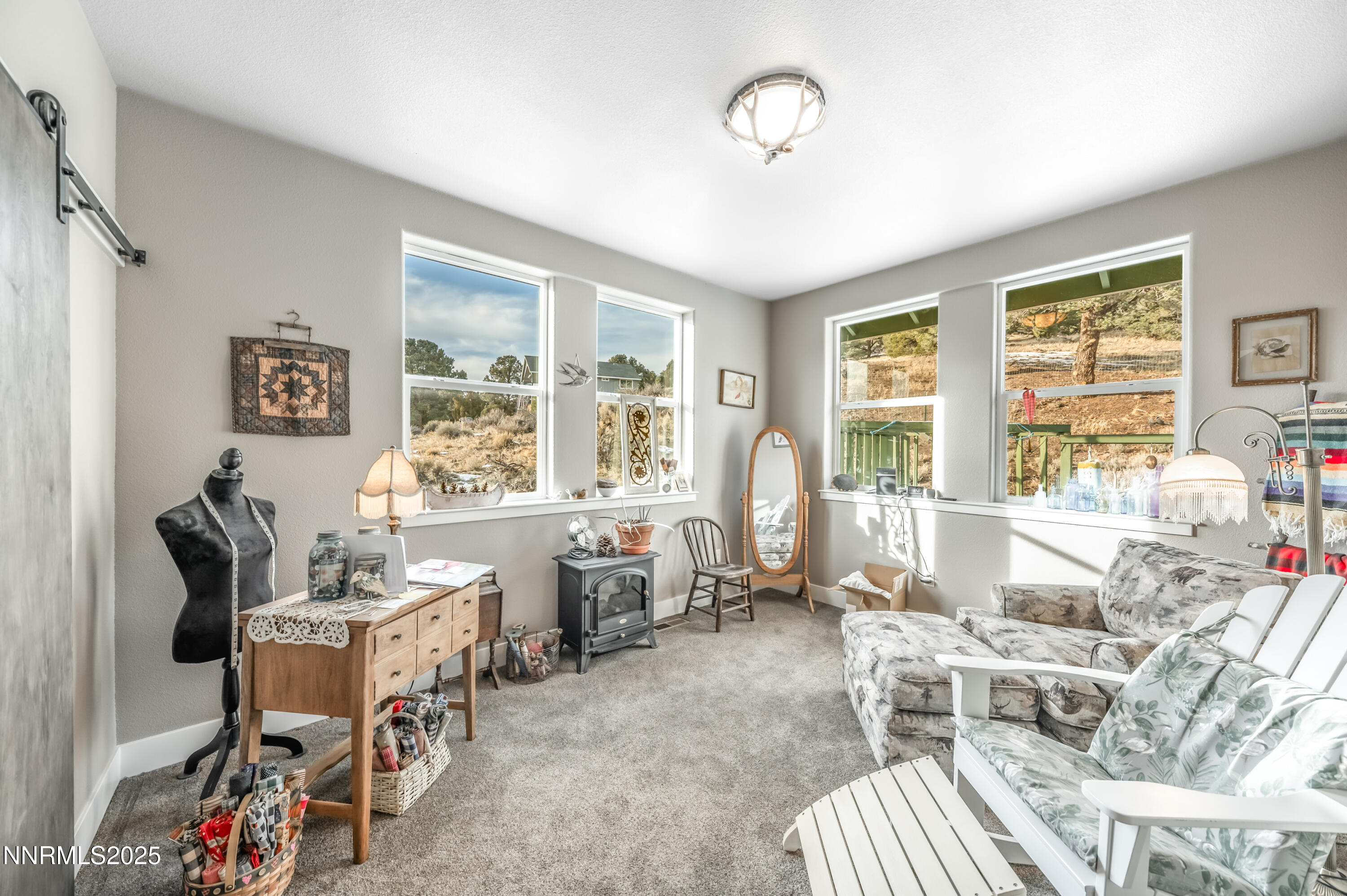2486 Cartwright Road Reno, NV 89521 - Photo 18 of 44 a living room with furniture and a large window