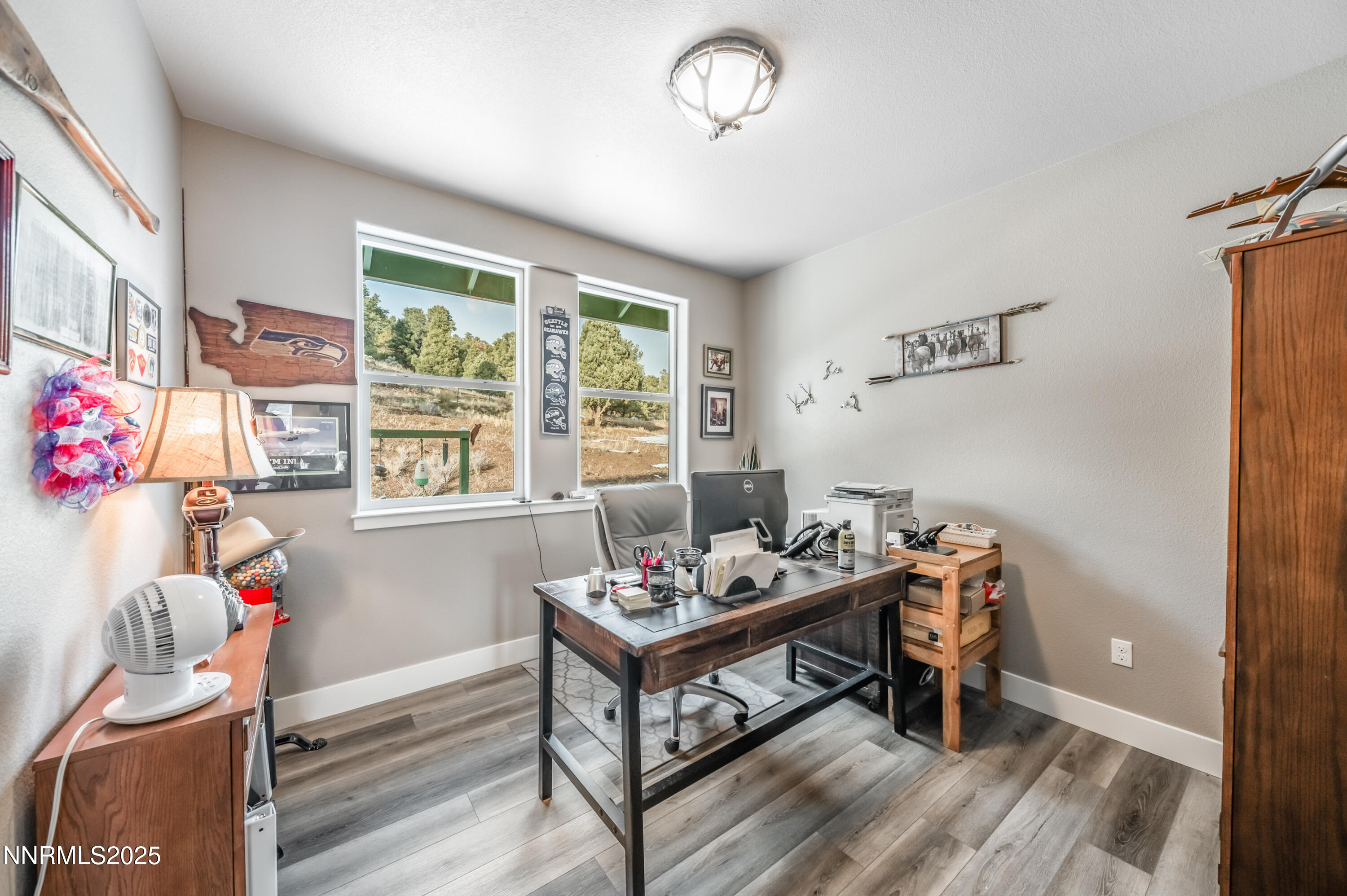 2486 Cartwright Road Reno, NV 89521 - Photo 20 of 44 a bedroom with furniture and a window
