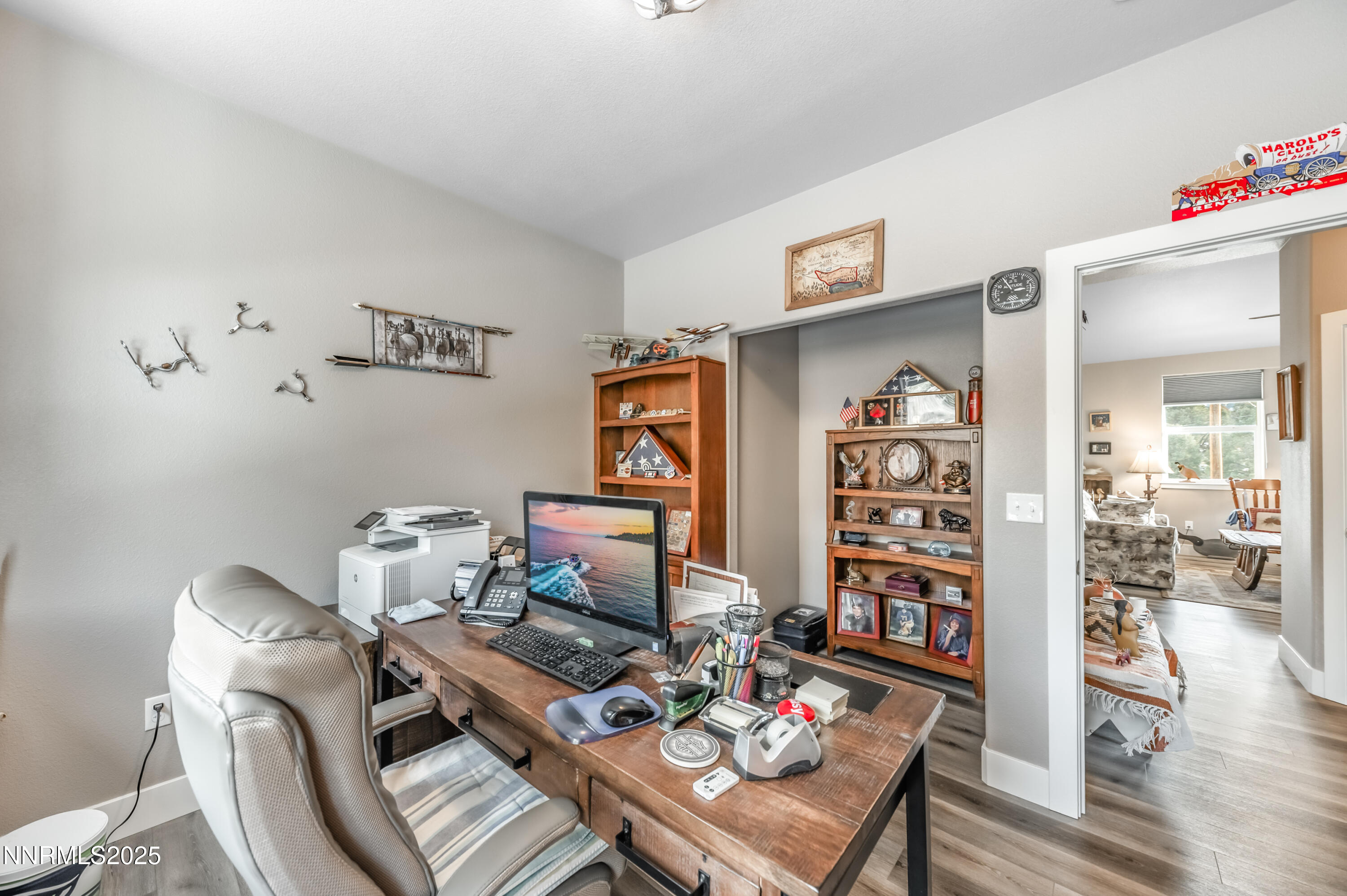 2486 Cartwright Road Reno, NV 89521 - Photo 21 of 44 a living room with furniture and wooden floor