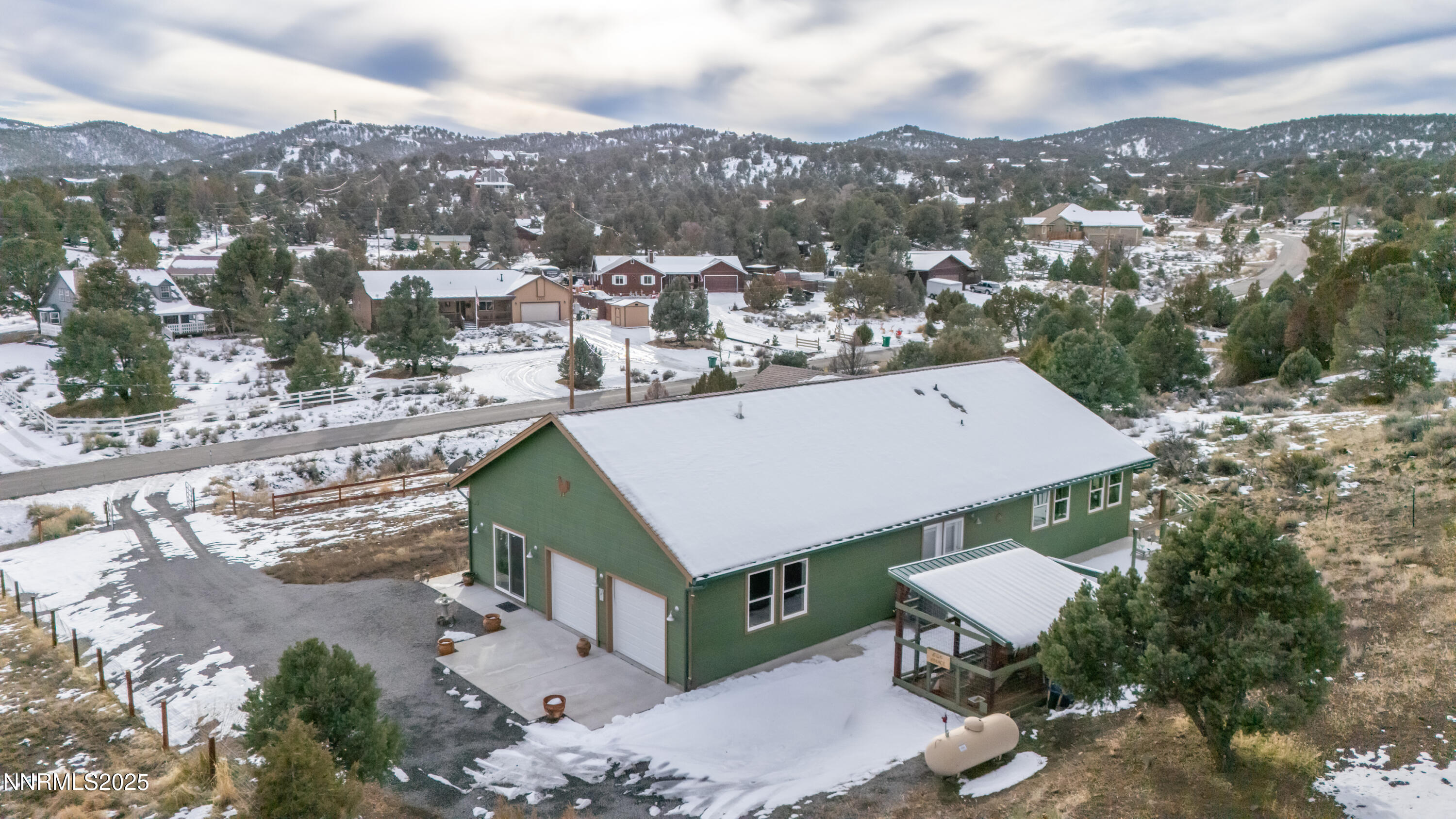 2486 Cartwright Road Reno, NV 89521 - Photo 31 of 44 an aerial view of a house with a mountain