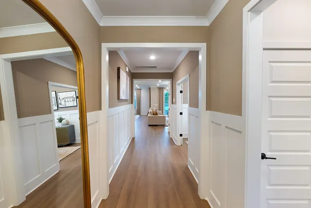 a living room with furniture fireplace and flat screen tv
