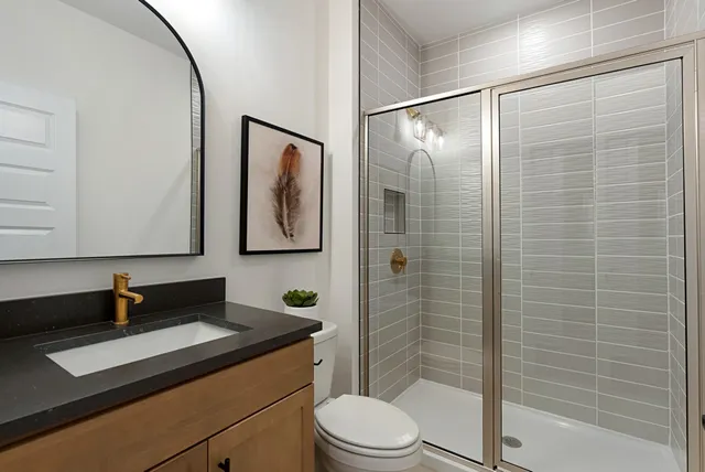 a view of hallway that has closet