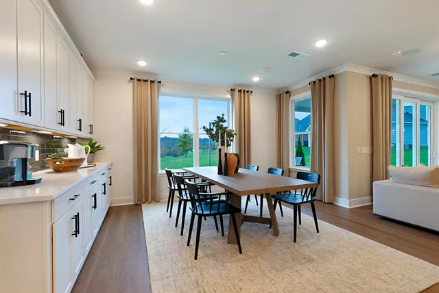 a view of livingroom with furniture and windows